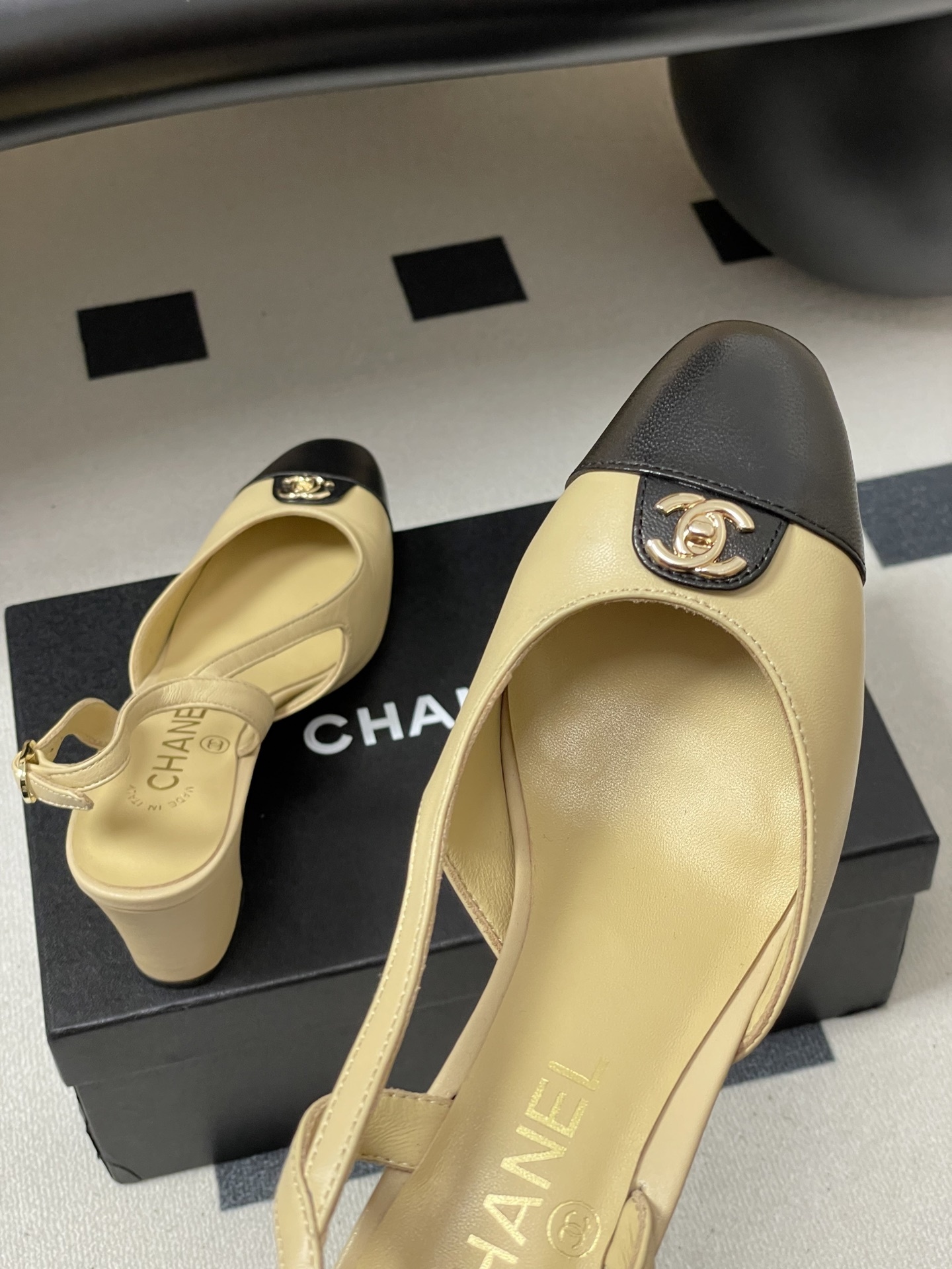 Chanel Two-Tone Beige and Black Leather Slingback Pumps