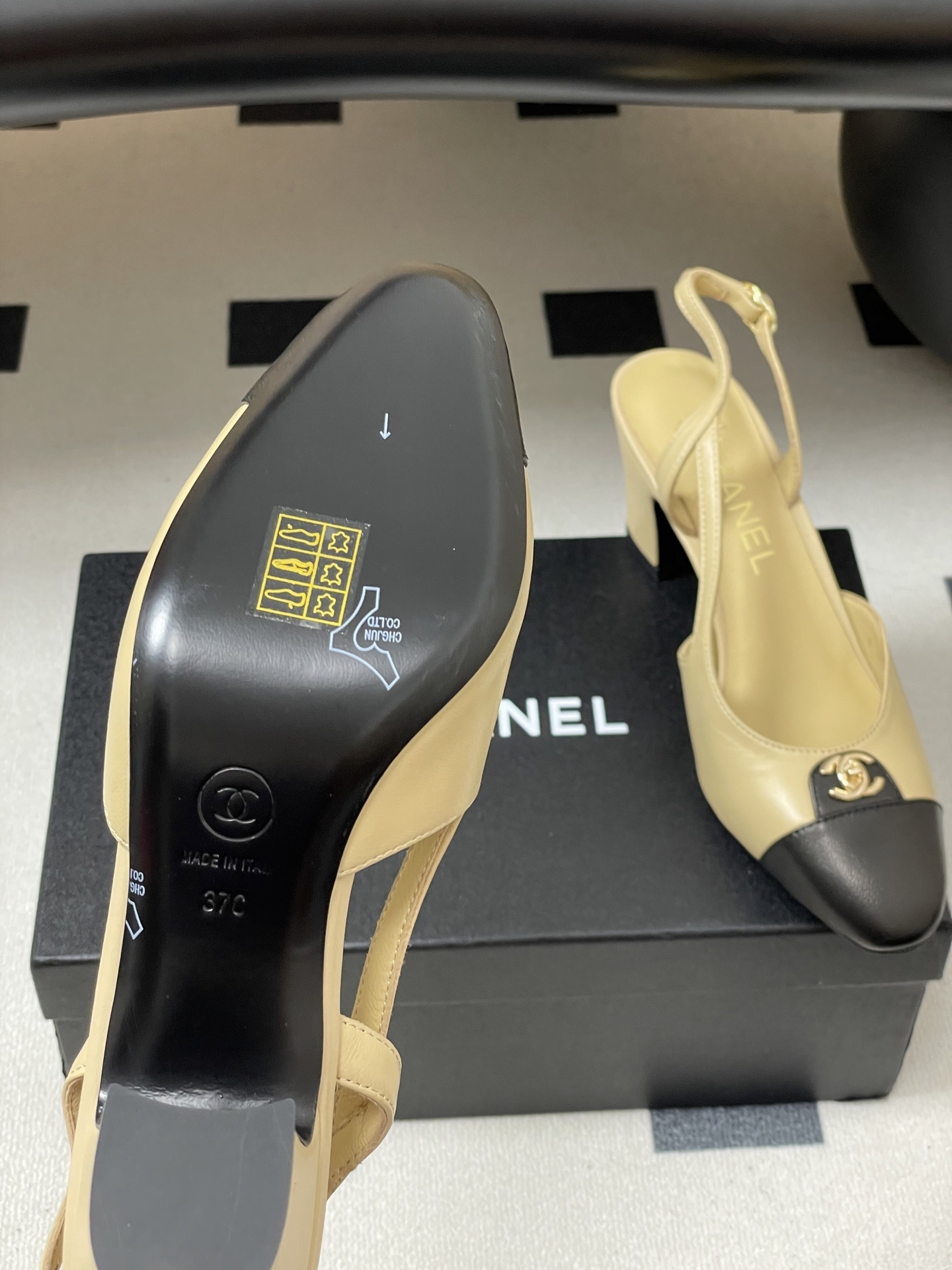 Chanel Two-Tone Beige and Black Leather Slingback Pumps