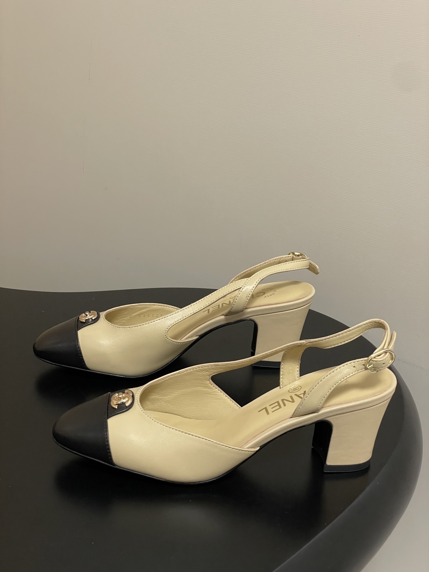 Chanel Two-Tone Beige and Black Leather Slingback Pumps