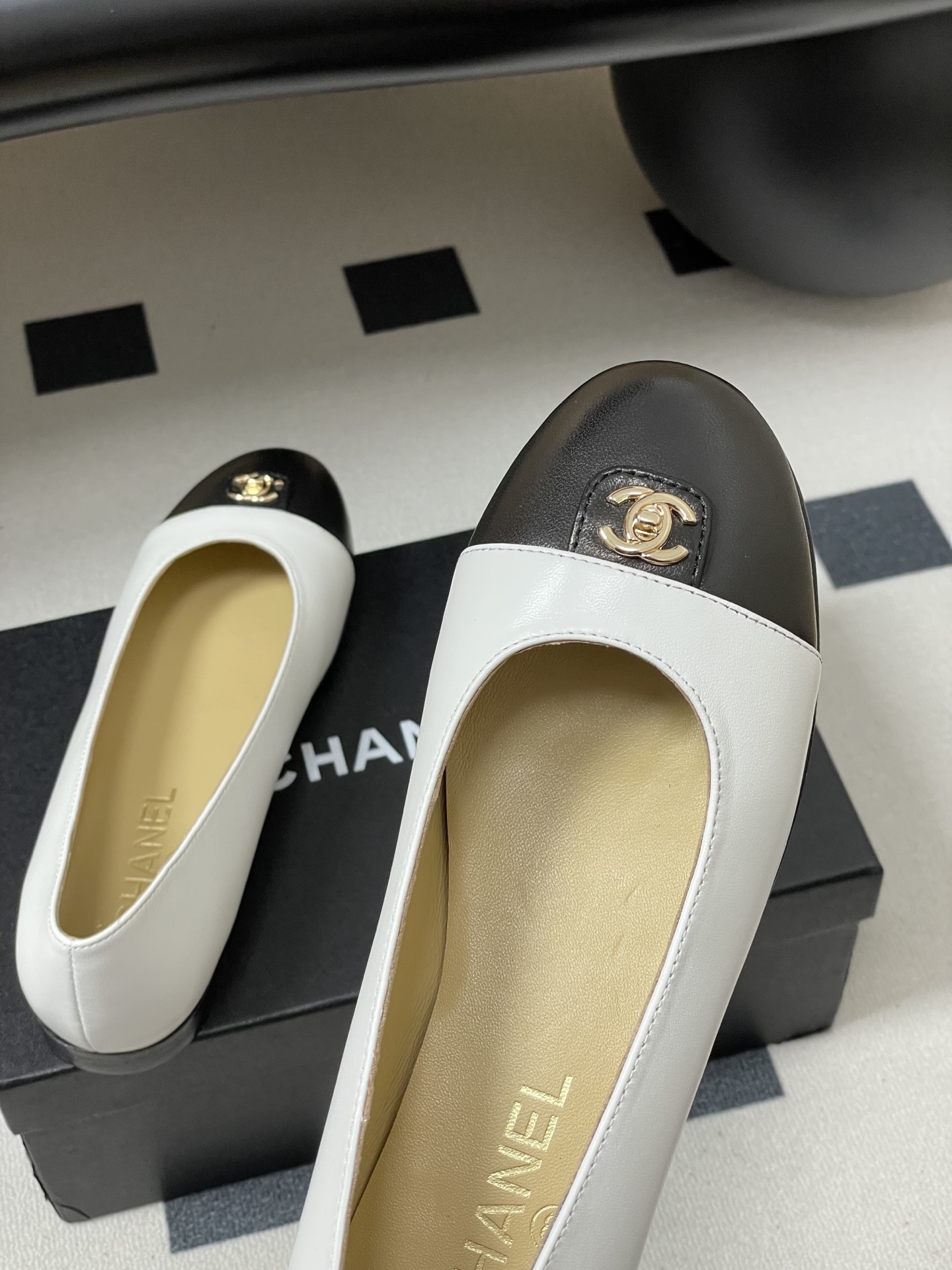 Chanel Classic Two-Tone Leather Ballet Flats - White & Black