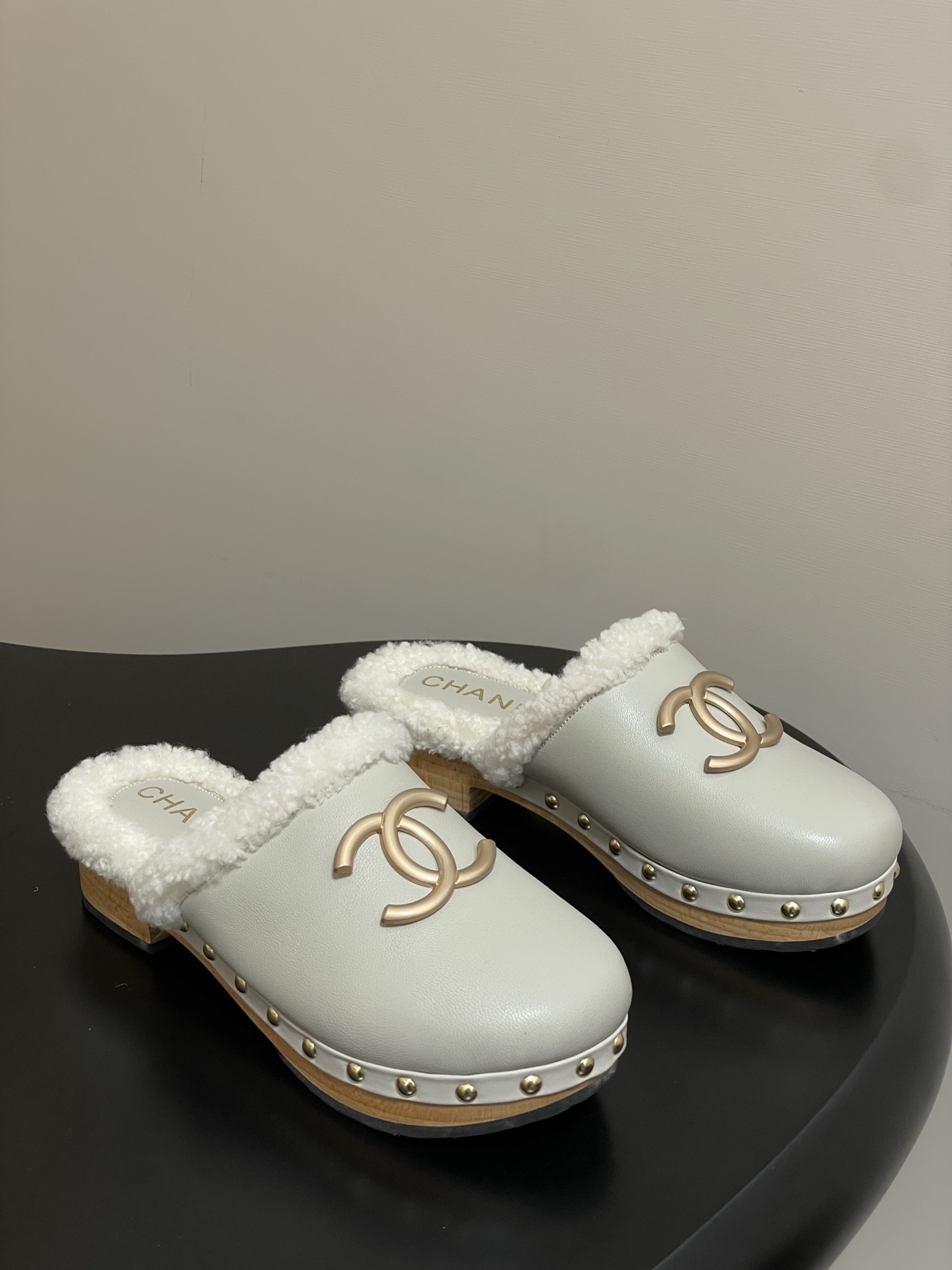 Chanel Shearling-Lined Leather Clogs – White & Gold Platform Mules