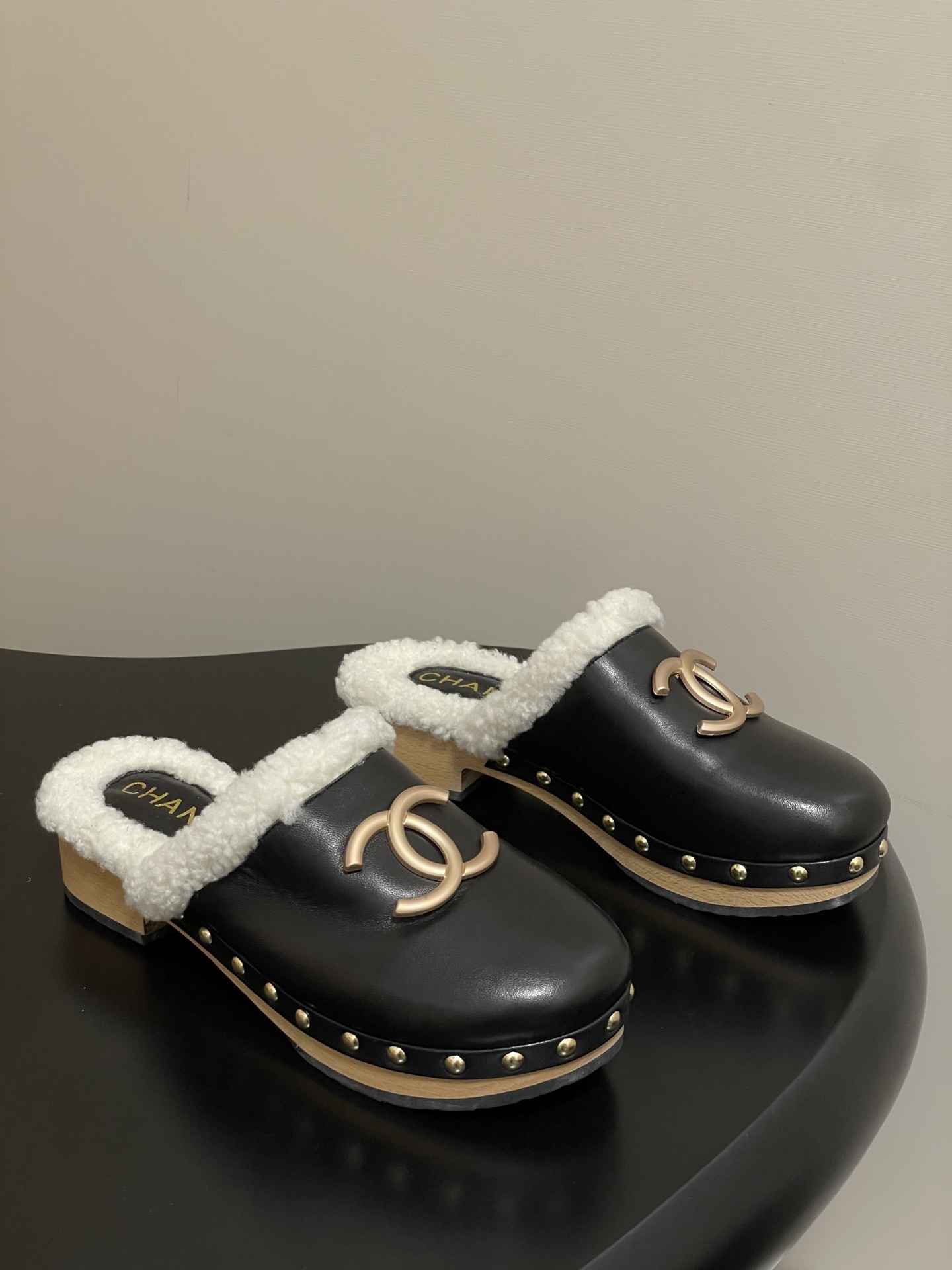 Chanel Black Leather Shearling Lined Clogs with Gold CC Logo