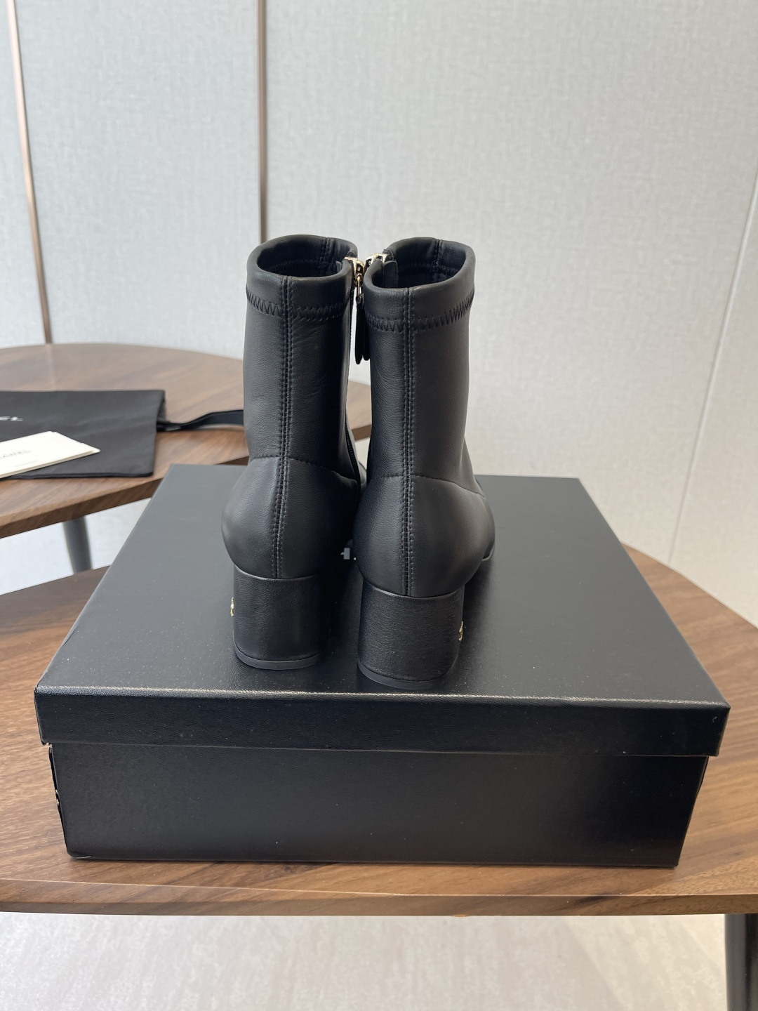 Chanel Luxury Black Leather Ankle Boots with Cap Toe CC Heel