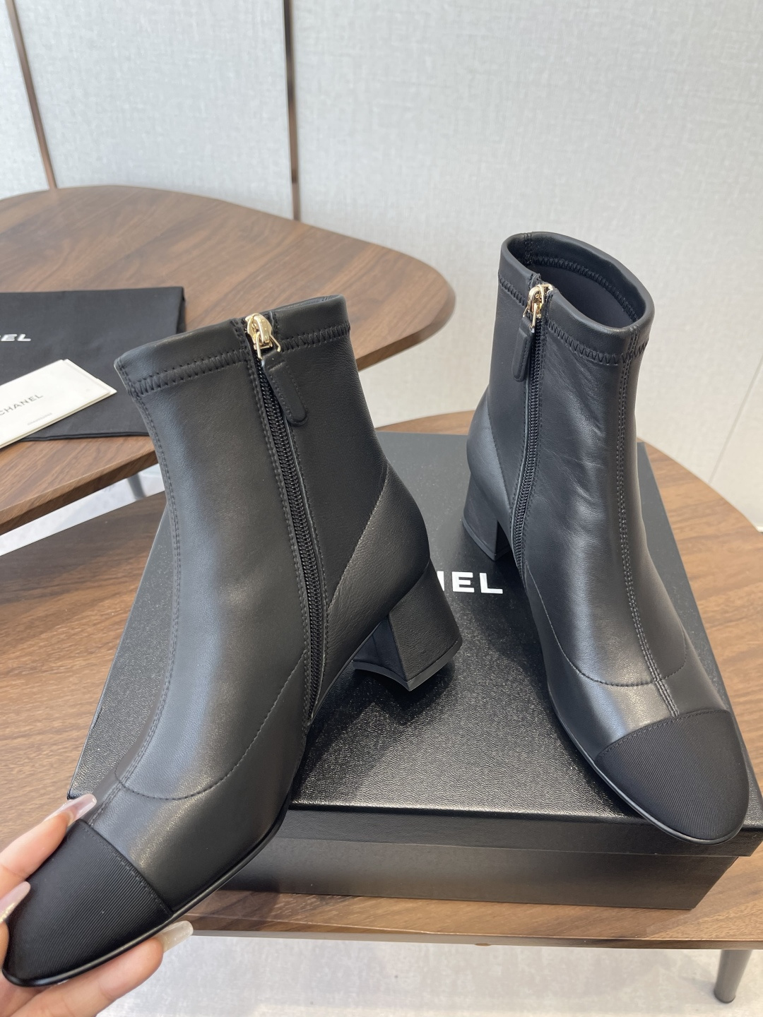 Chanel Luxury Black Leather Ankle Boots with Cap Toe CC Heel