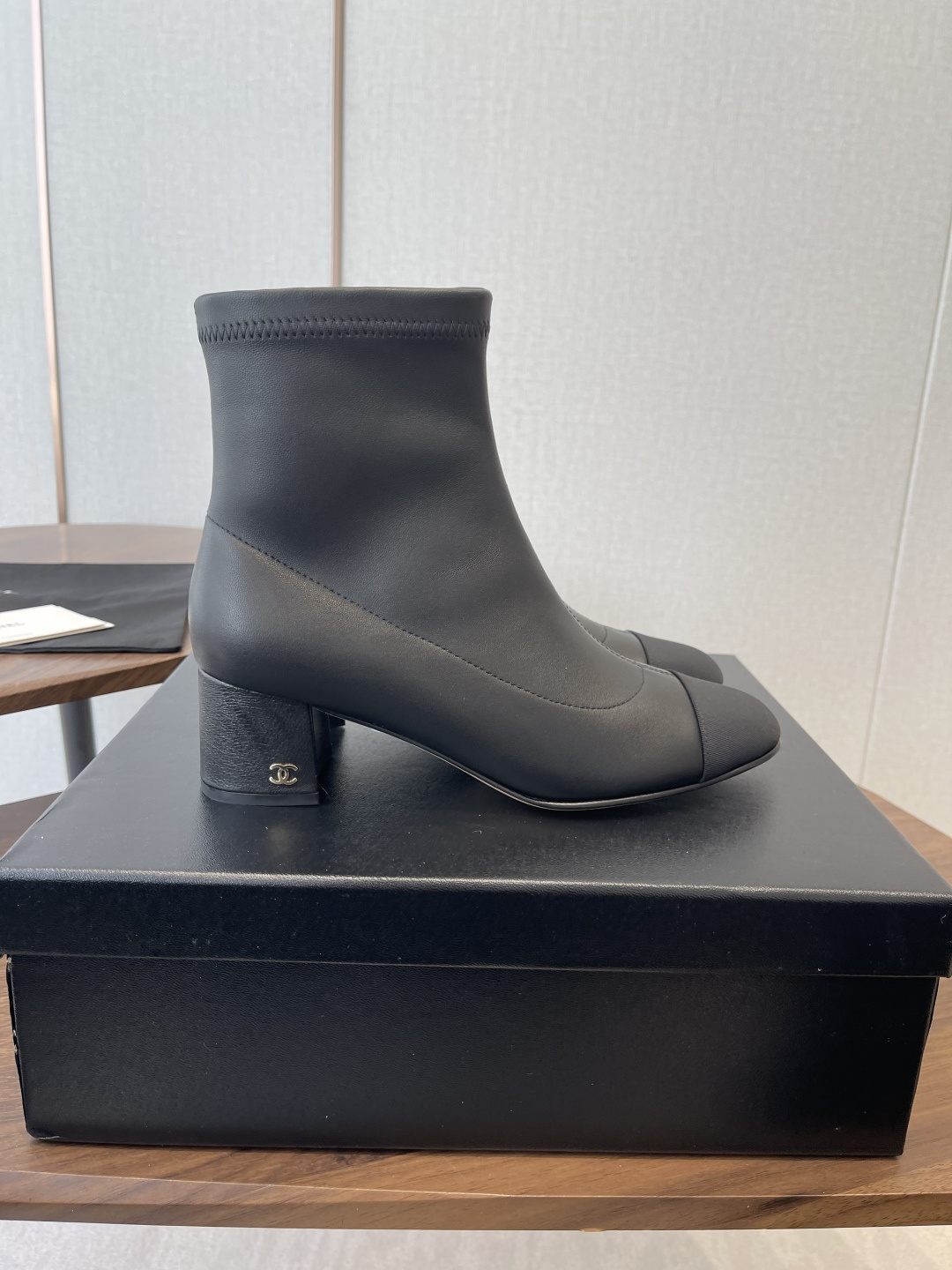 Chanel Luxury Black Leather Ankle Boots with Cap Toe CC Heel