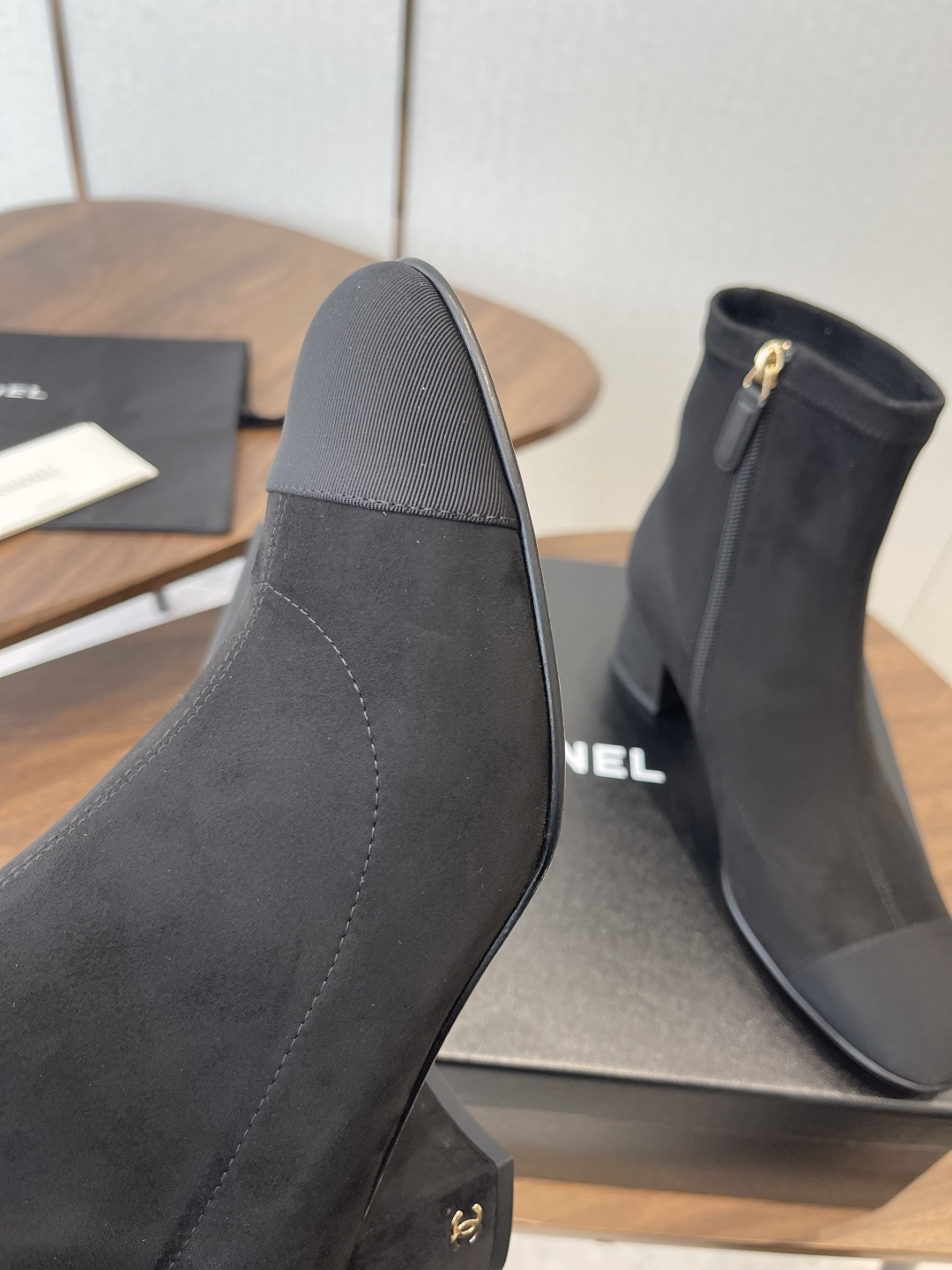 Luxury Black Suede Ankle Boots with Elegant Block Heel & Gold Logo