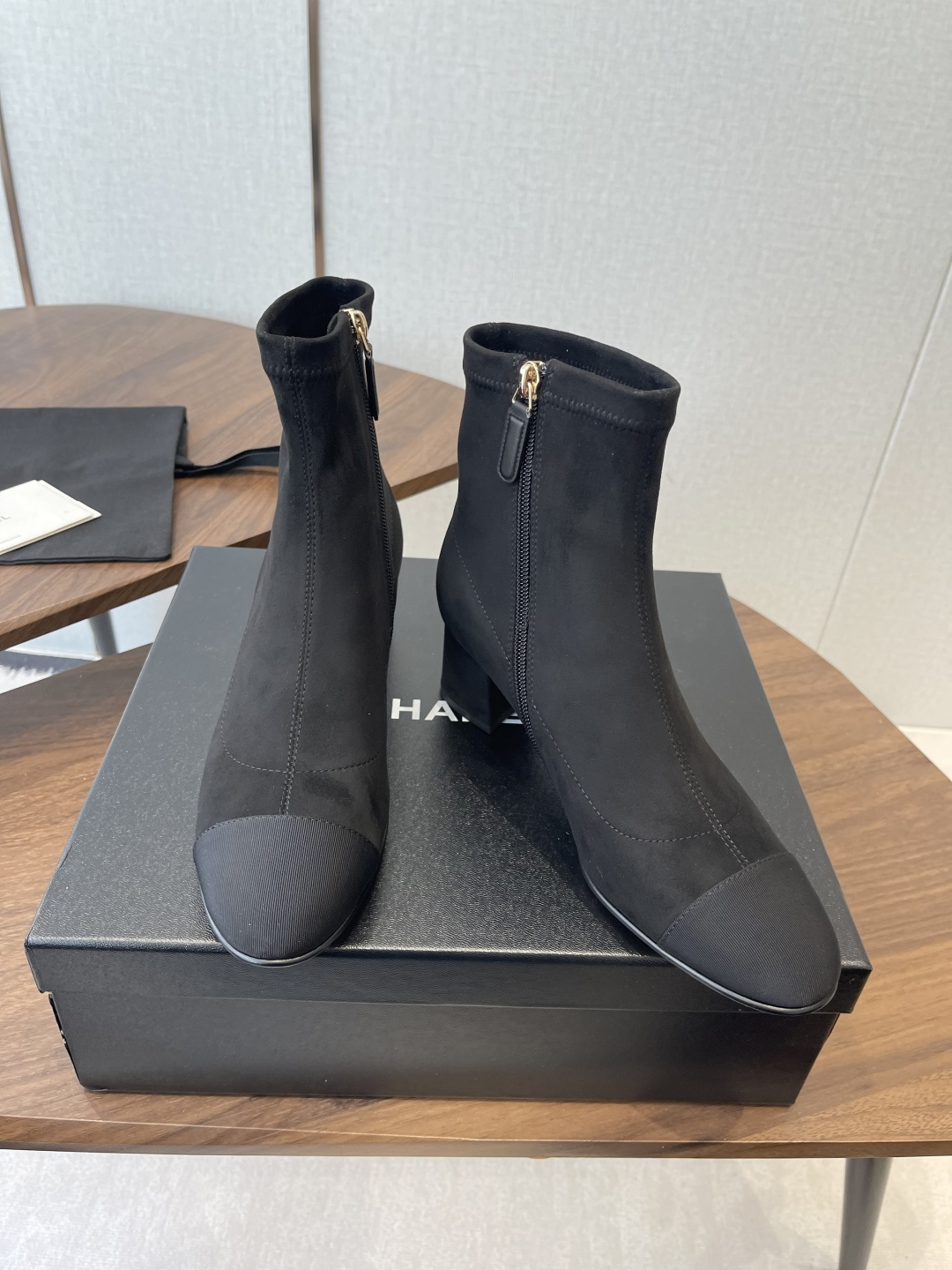 Luxury Black Suede Ankle Boots with Elegant Block Heel & Gold Logo