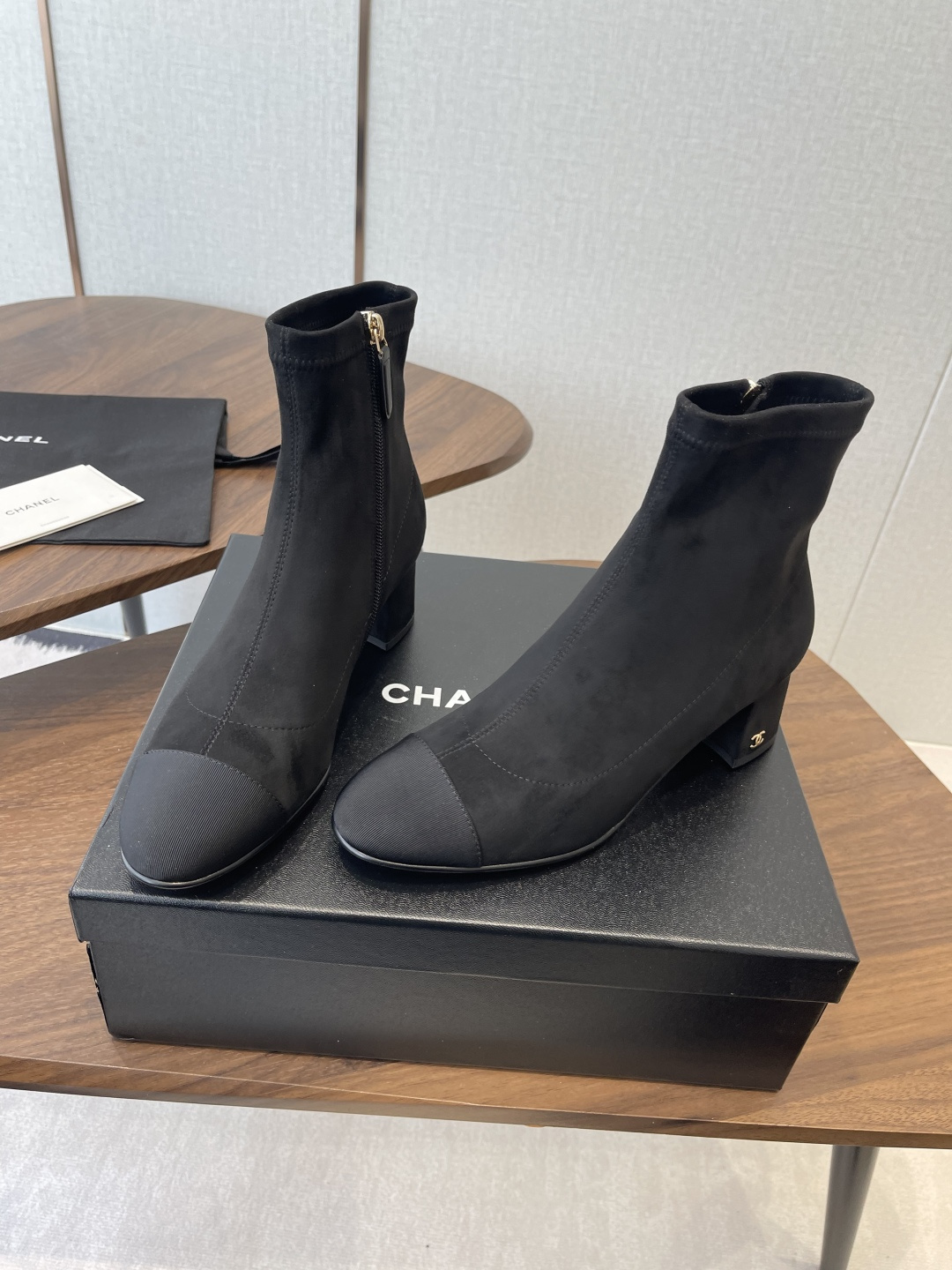 Luxury Black Suede Ankle Boots with Elegant Block Heel & Gold Logo