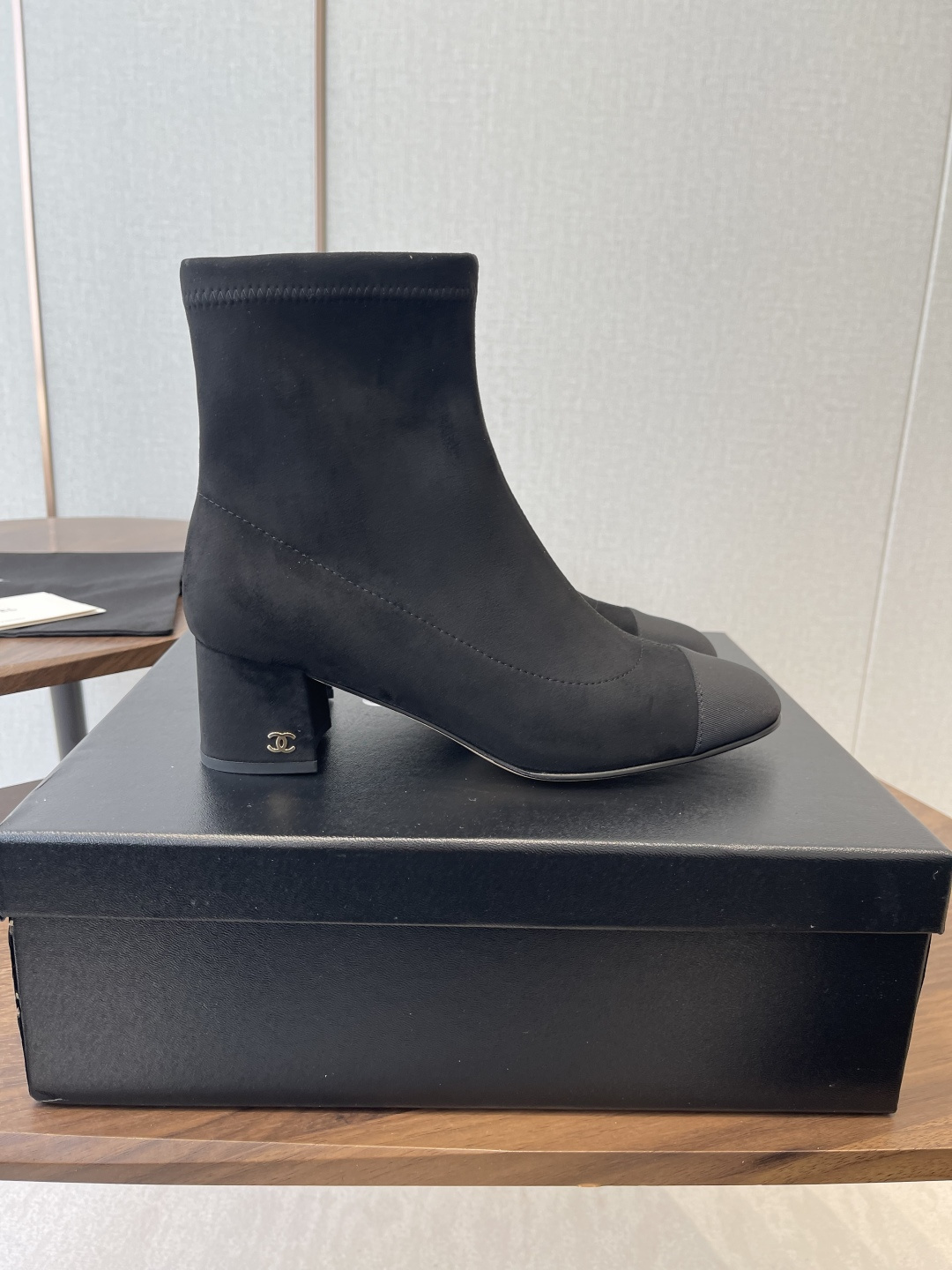 Luxury Black Suede Ankle Boots with Elegant Block Heel & Gold Logo