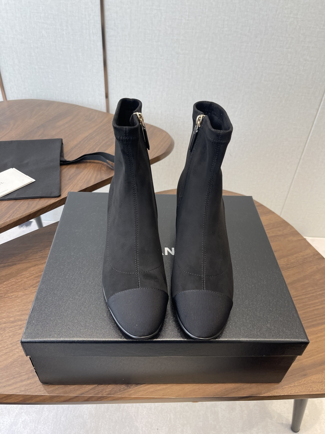 Luxury Black Suede Ankle Boots with Elegant Block Heel & Gold Logo