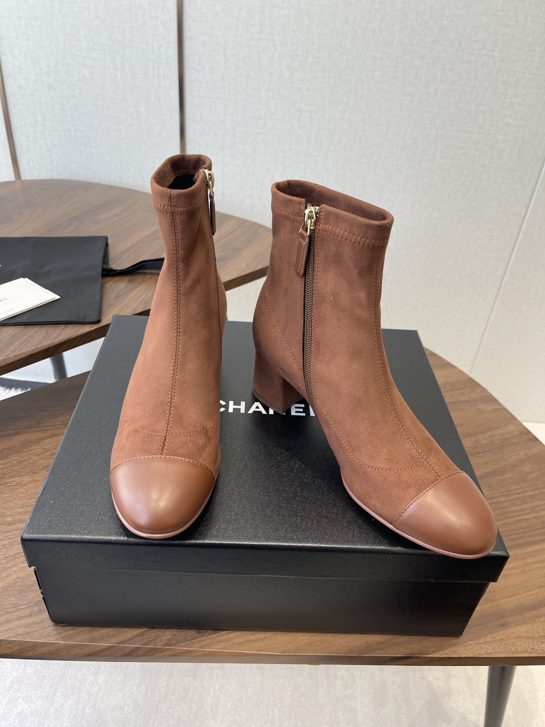 Chanel Brown Suede Ankle Boots - Elegant Leather Cap Toe Design
