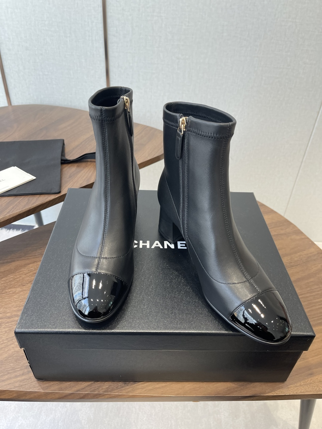 Chanel Black Leather Ankle Boots with Patent Cap Toe & Block Heel