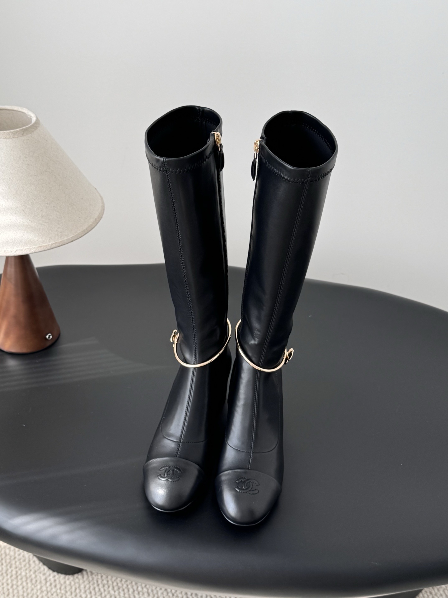 Women’s Luxury Black Knee High Boots with Gold Chain Detail