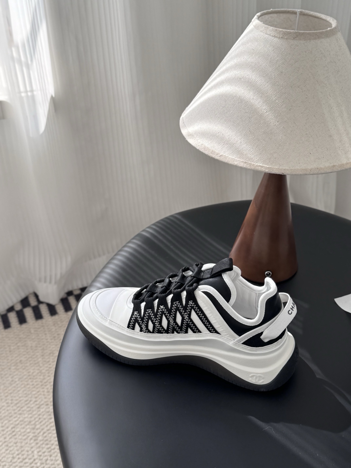 Chanel Women's Black & White Luxury Sneakers with CC Gold Logo