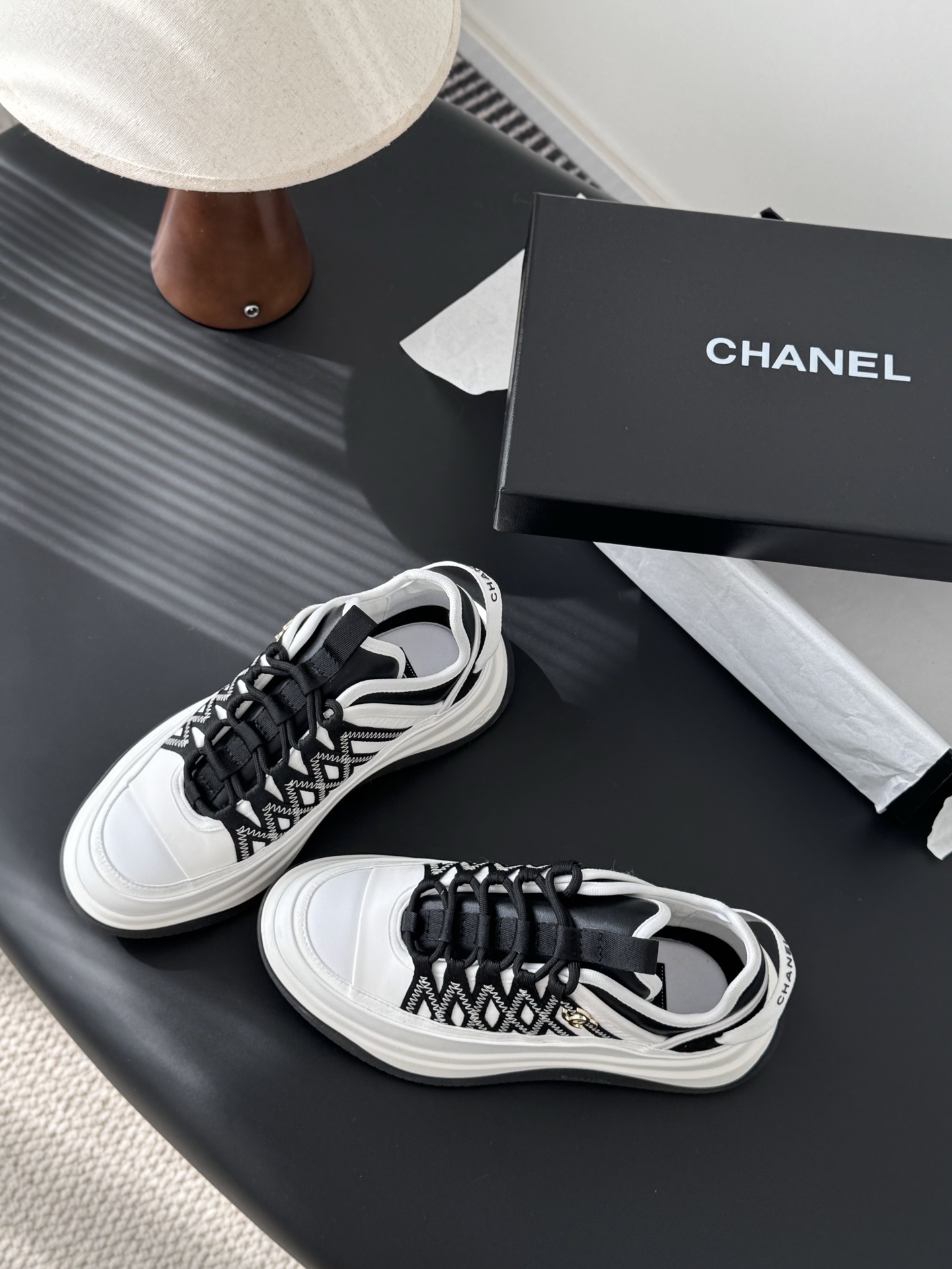 Chanel Women's Black & White Luxury Sneakers with CC Gold Logo