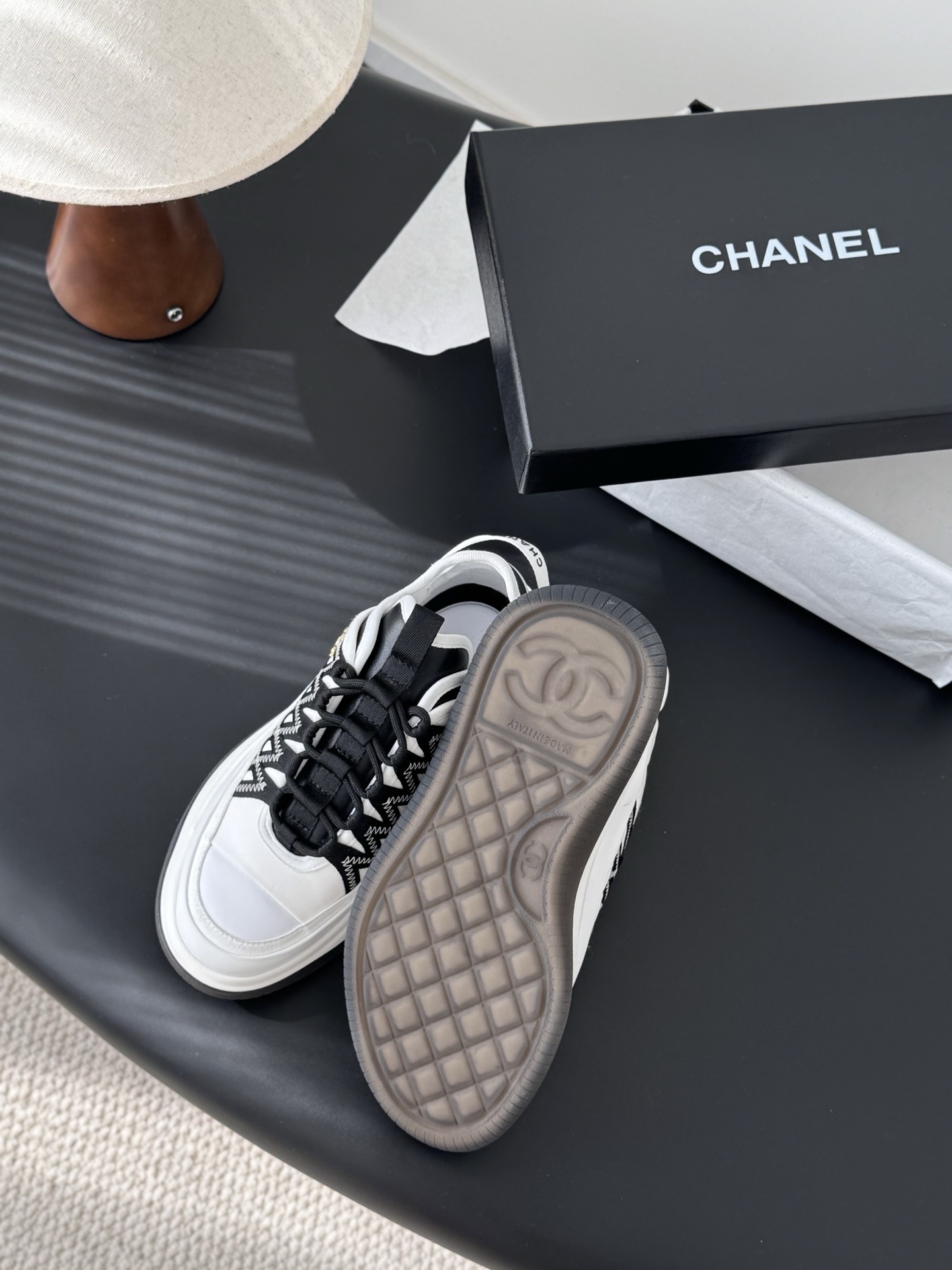 Chanel Women's Black & White Luxury Sneakers with CC Gold Logo