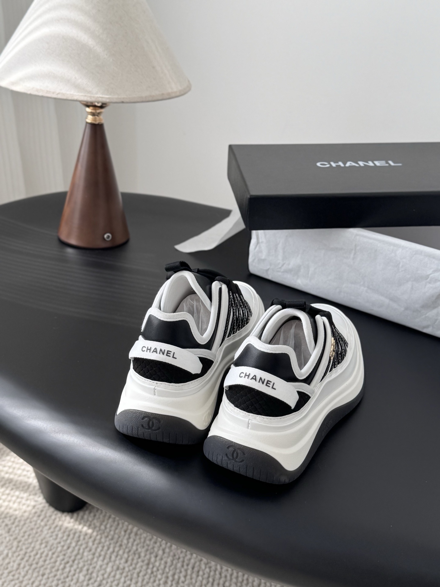 Chanel Women's Black & White Luxury Sneakers with CC Gold Logo