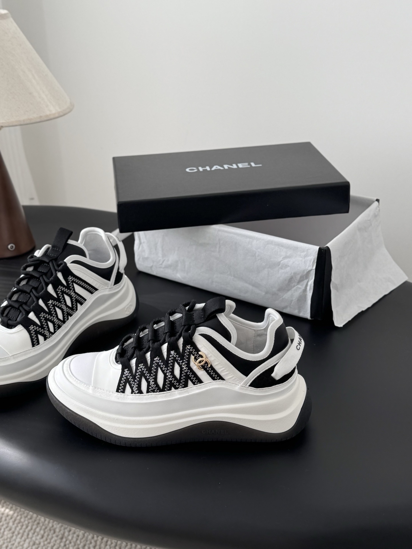 Chanel Women's Black & White Luxury Sneakers with CC Gold Logo