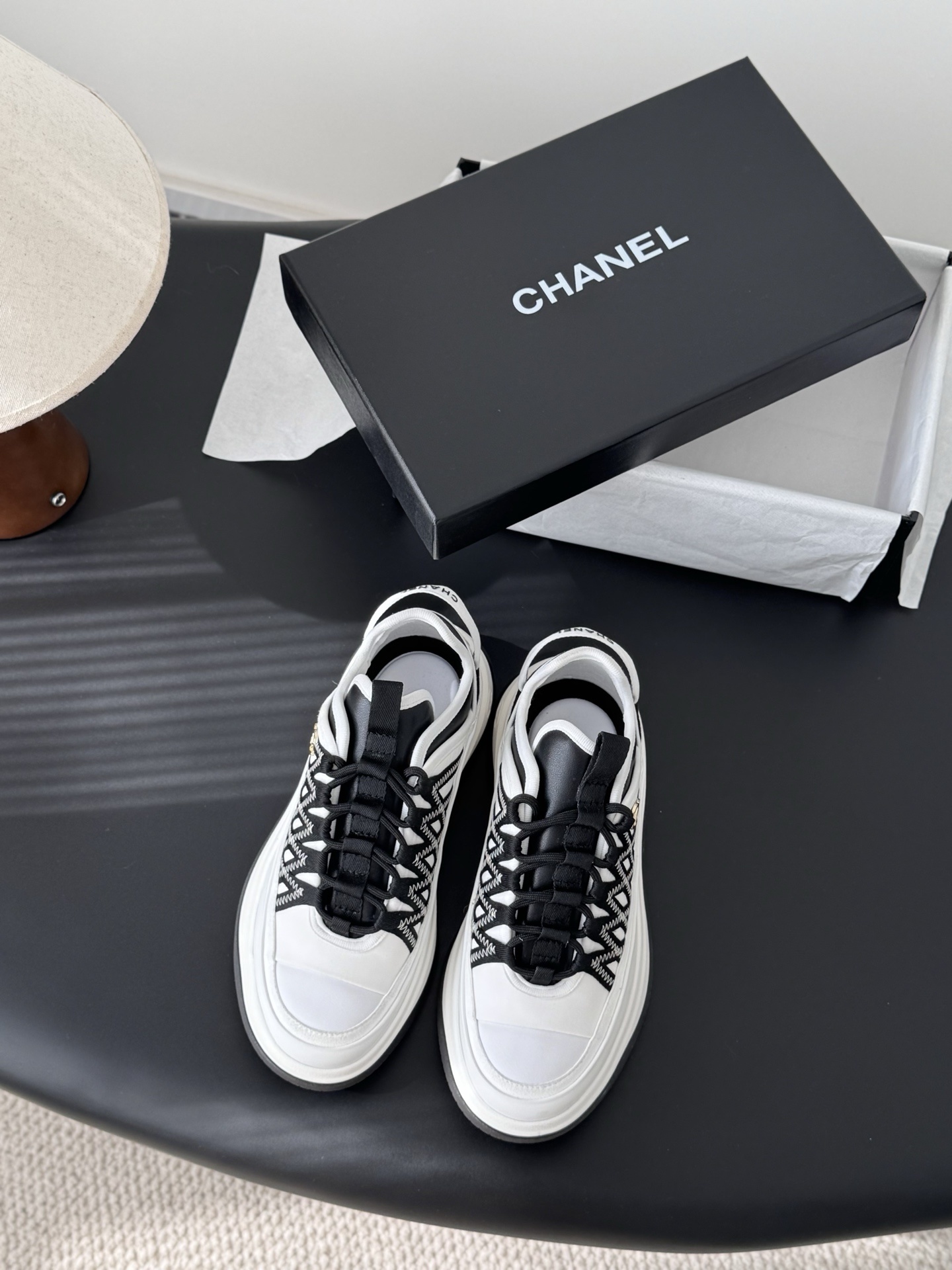 Chanel Women’s Black & White Luxury Sneakers with CC Gold Logo