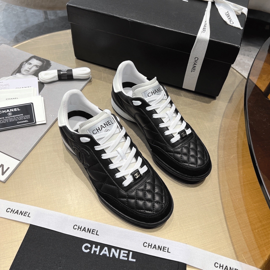 Chanel Women's Quilted Leather Sneakers - Black/White Luxury