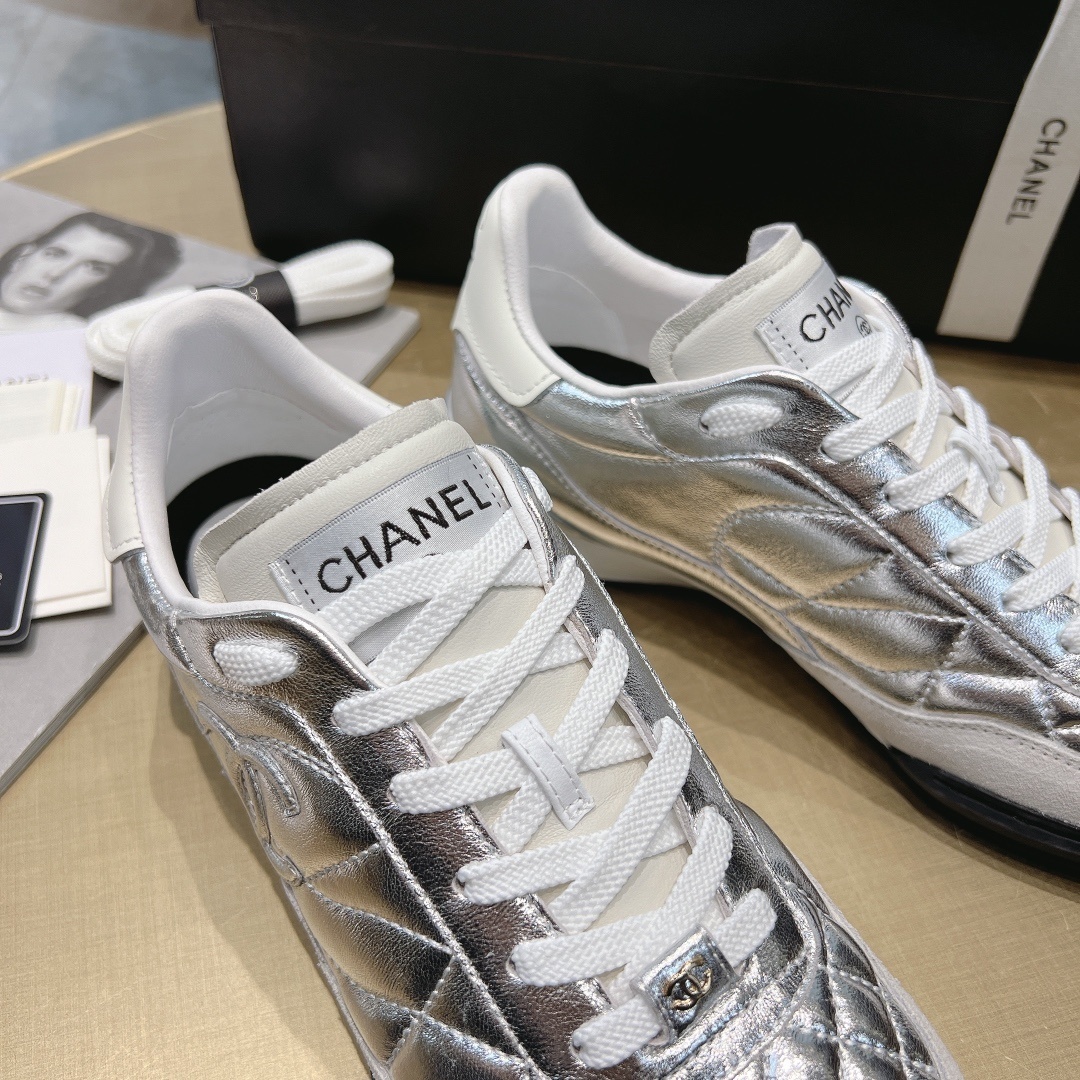 Luxury Chanel Silver Quilted Leather Low-Top Sneakers