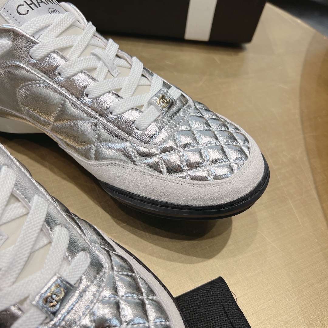Luxury Chanel Silver Quilted Leather Low-Top Sneakers