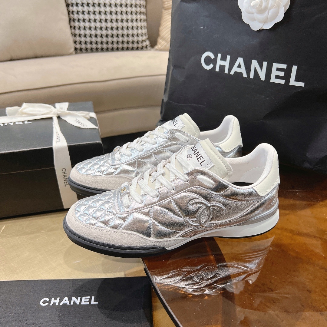 Luxury Chanel Silver Quilted Leather Low-Top Sneakers