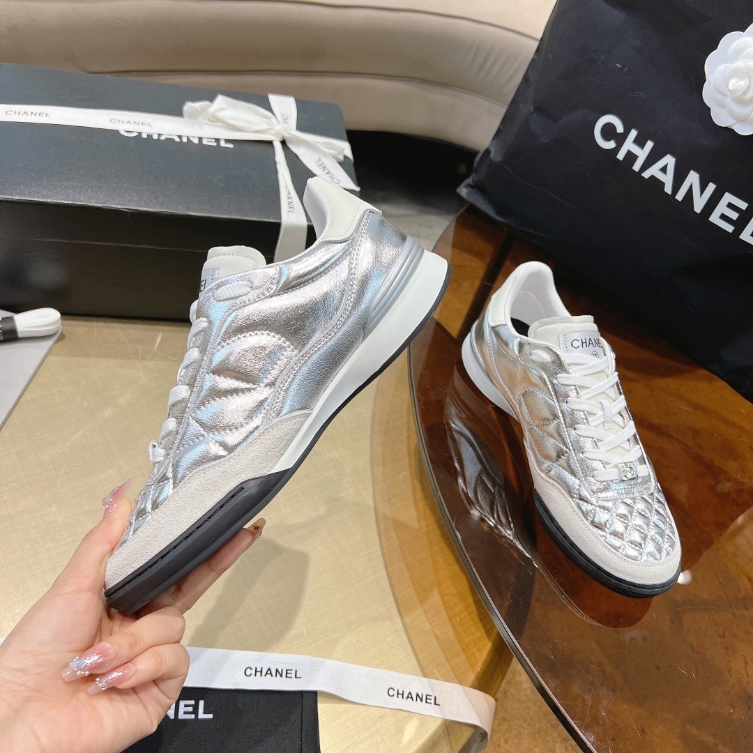 Luxury Chanel Silver Quilted Leather Low-Top Sneakers