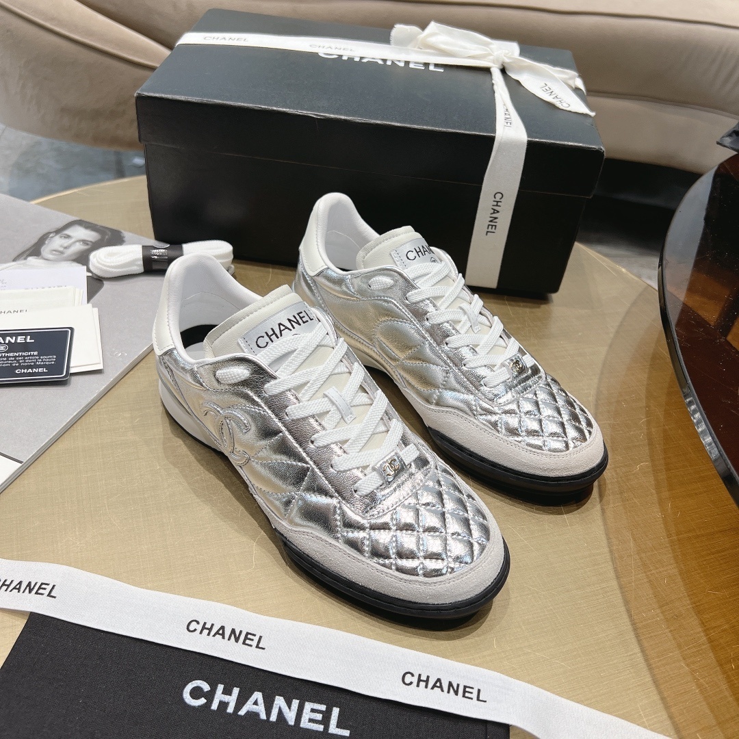Luxury Chanel Silver Quilted Leather Low-Top Sneakers