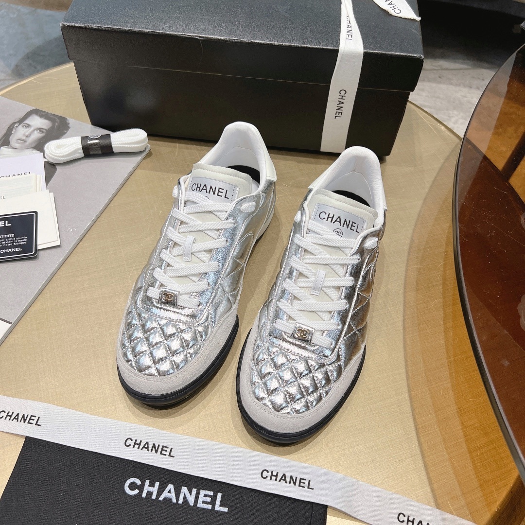 Luxury Chanel Silver Quilted Leather Low-Top Sneakers