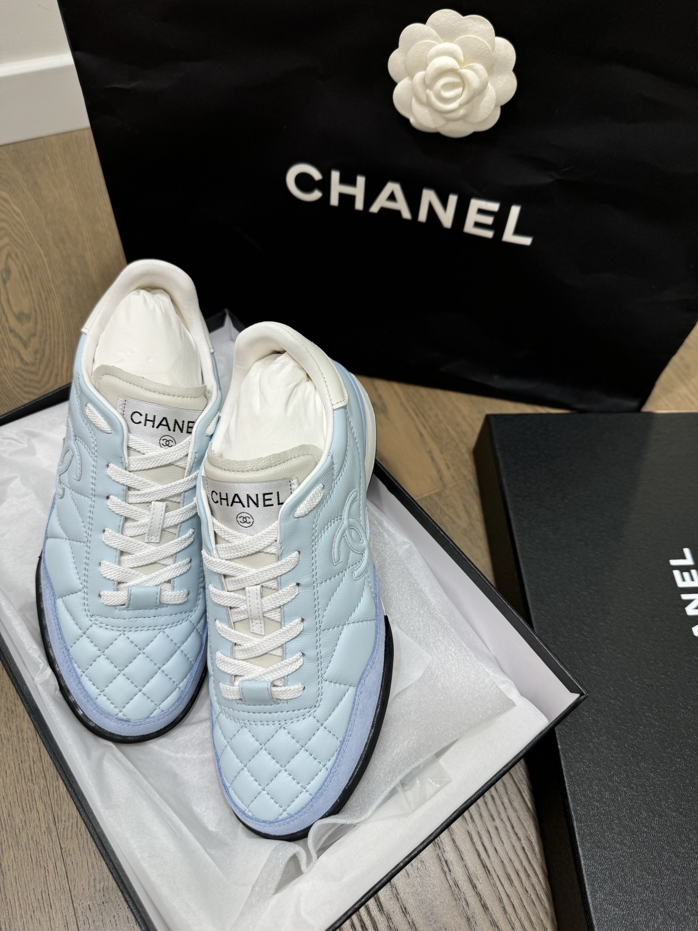 Chanel Quilted Leather Sneakers in Light Blue - Luxury Women's Shoes