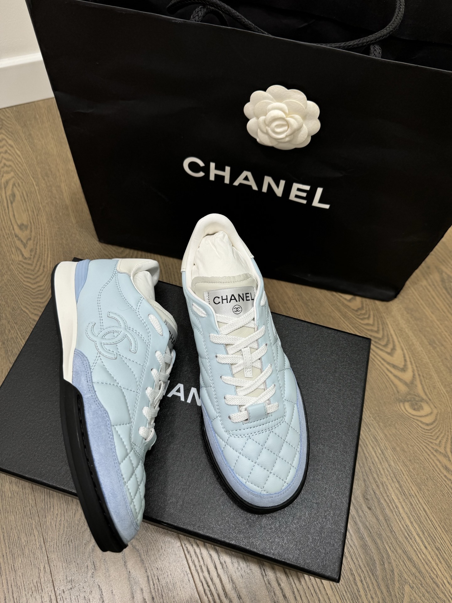 Chanel Quilted Leather Sneakers in Light Blue - Luxury Women's Shoes