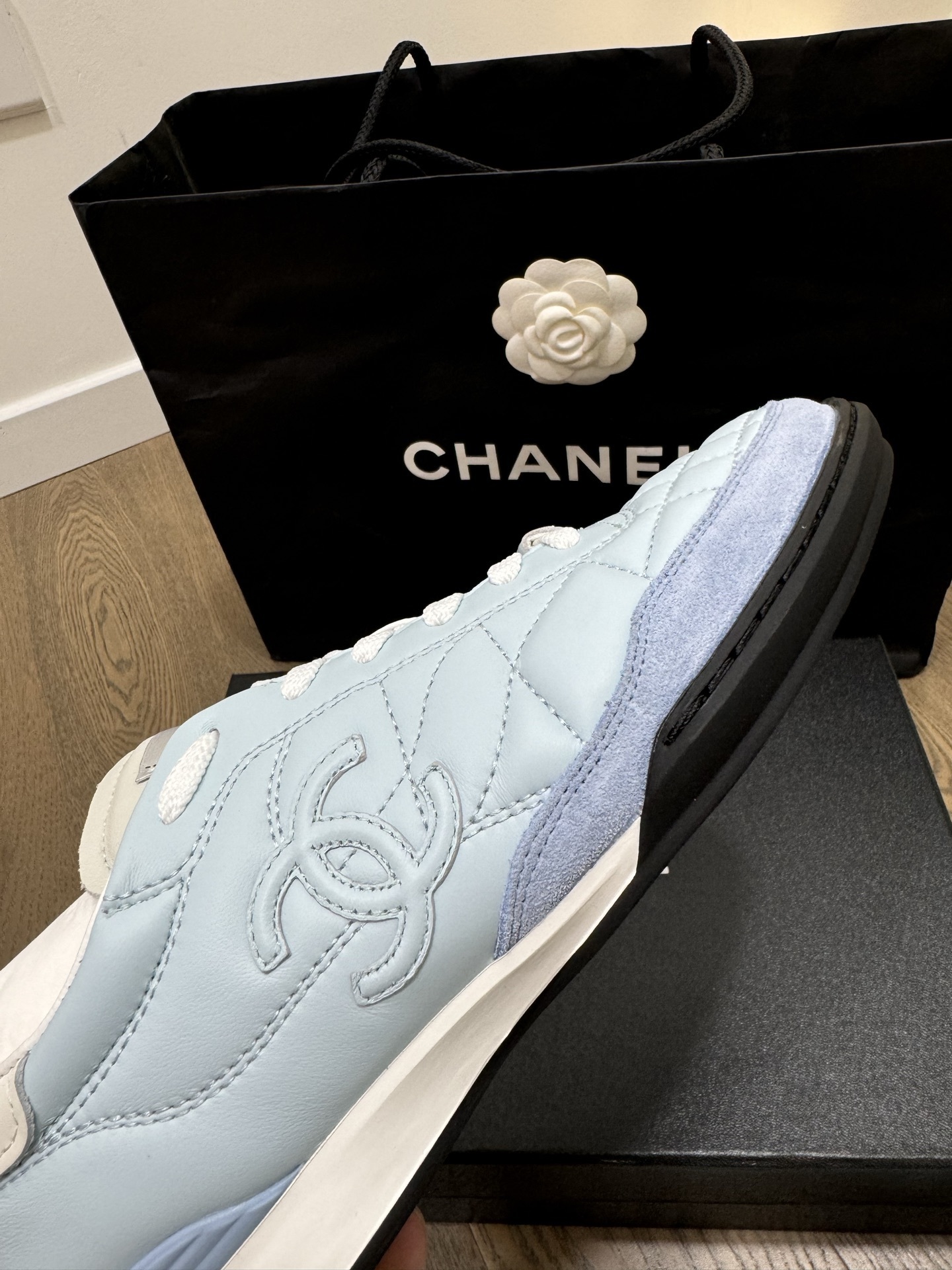 Chanel Quilted Leather Sneakers in Light Blue - Luxury Women's Shoes