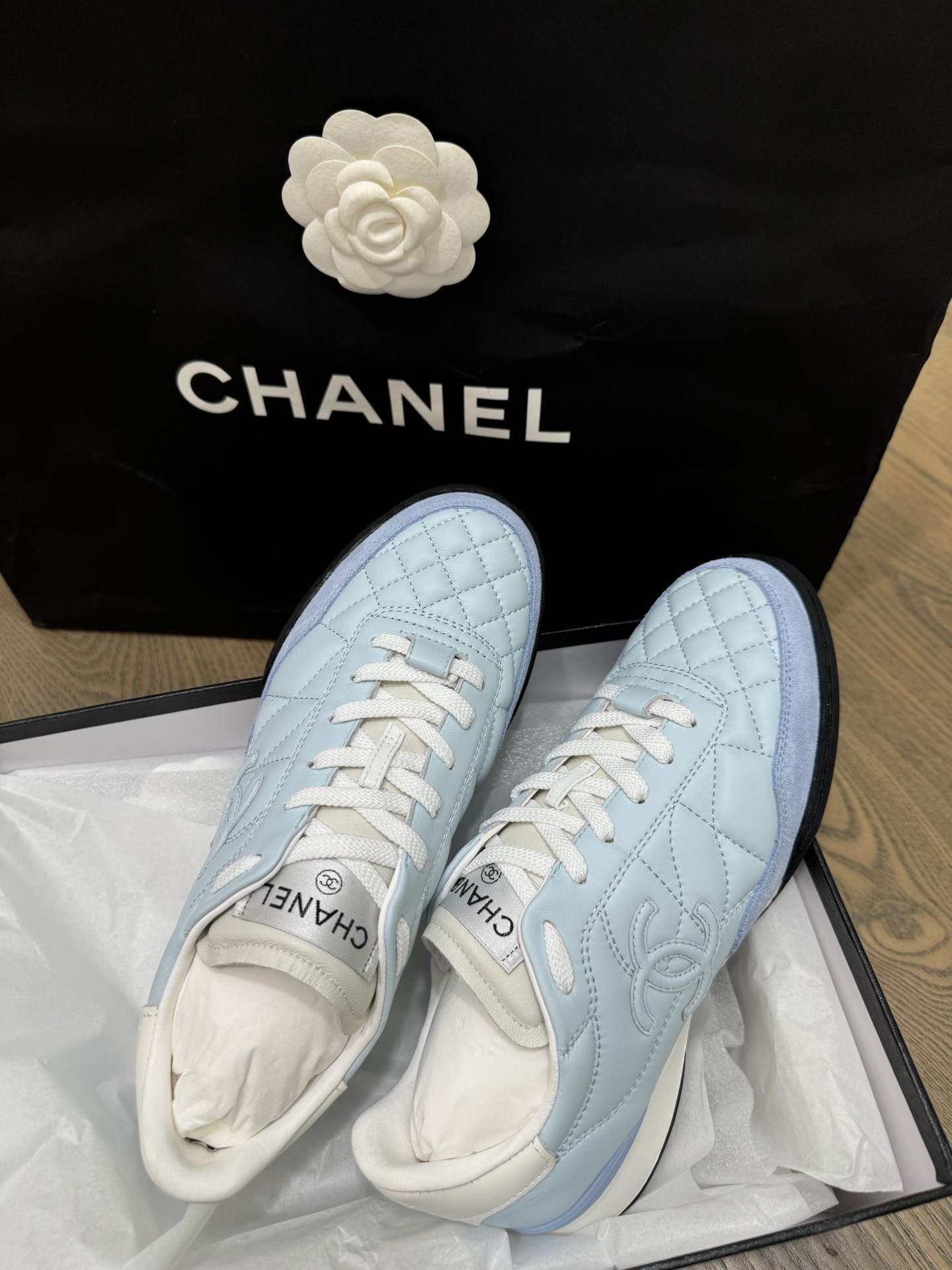 Chanel Quilted Leather Sneakers in Light Blue - Luxury Women's Shoes