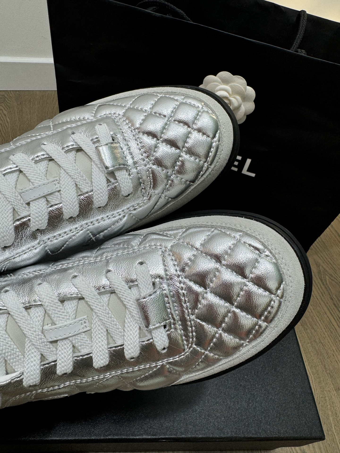 Chanel Quilted Metallic Silver Sneakers - Luxury Women's Trainers