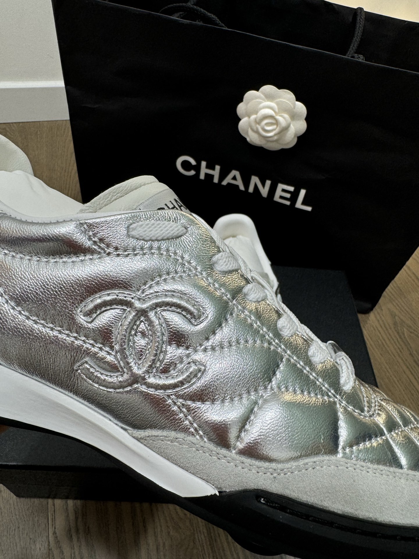 Chanel Quilted Metallic Silver Sneakers - Luxury Women's Trainers