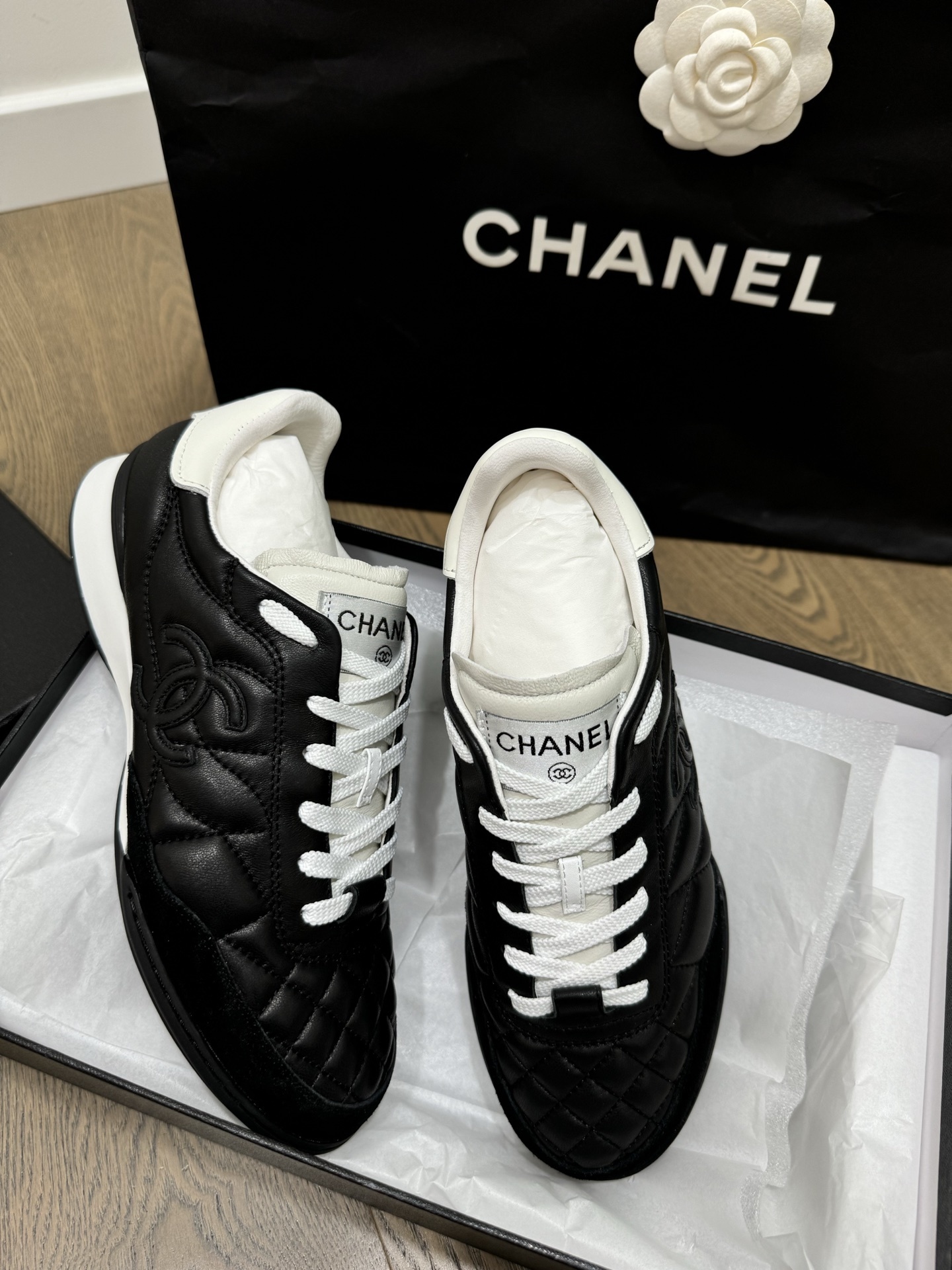 Chanel Black and White Quilted Lambskin Sneakers with CC Logo