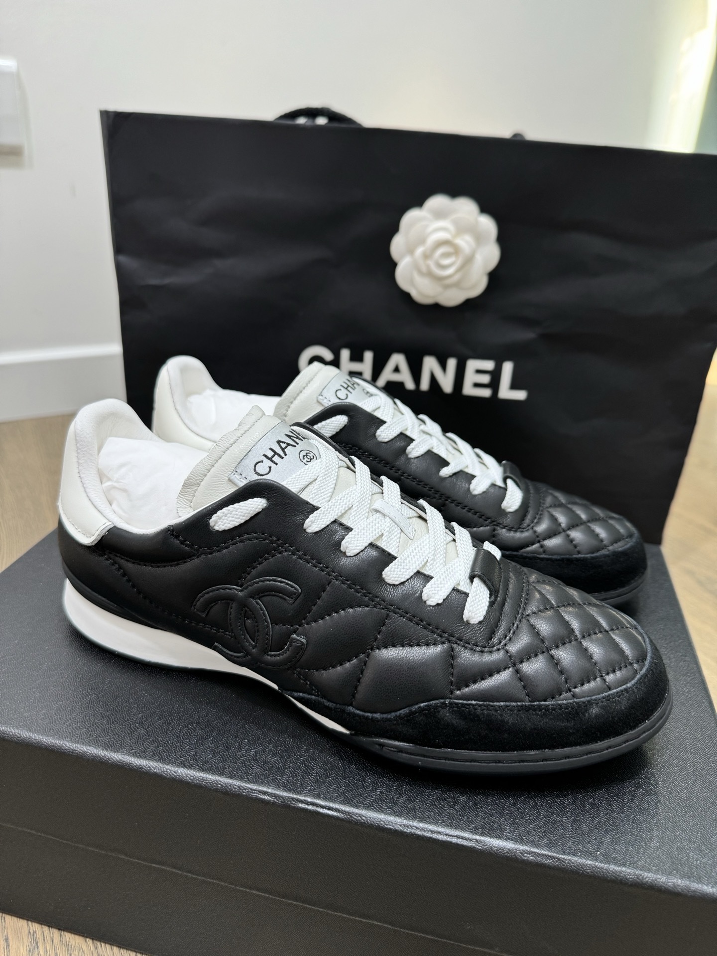 Chanel Black and White Quilted Lambskin Sneakers with CC Logo
