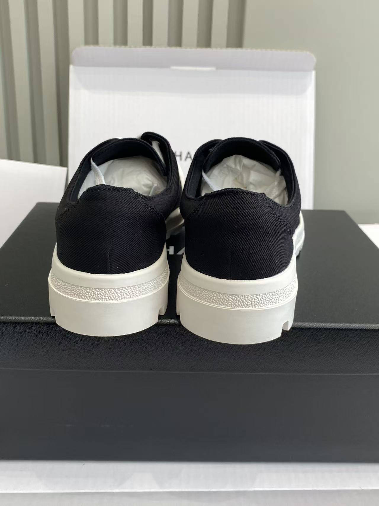 Chanel Black Canvas Low-Top Sneakers with White Lug Sole