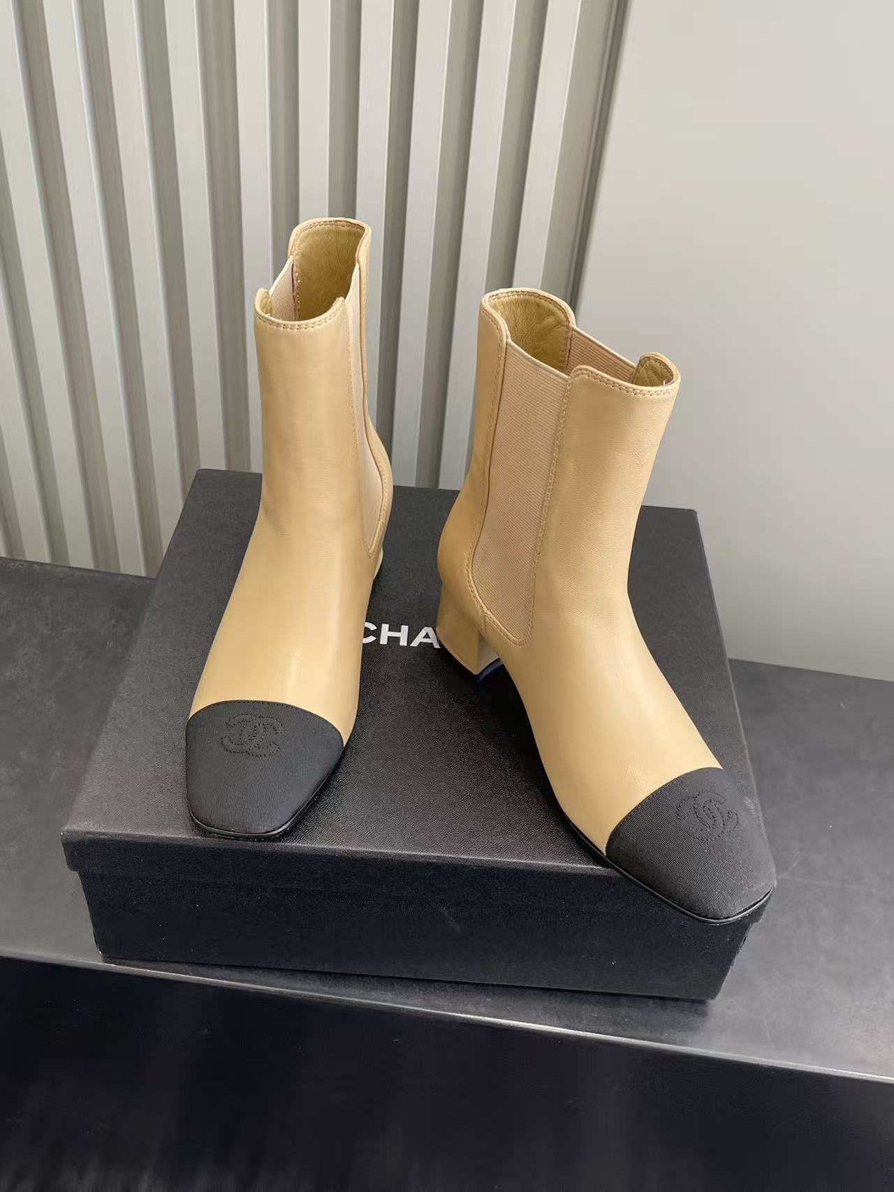 Luxury Beige Leather Ankle Boots with Black Cap Toe