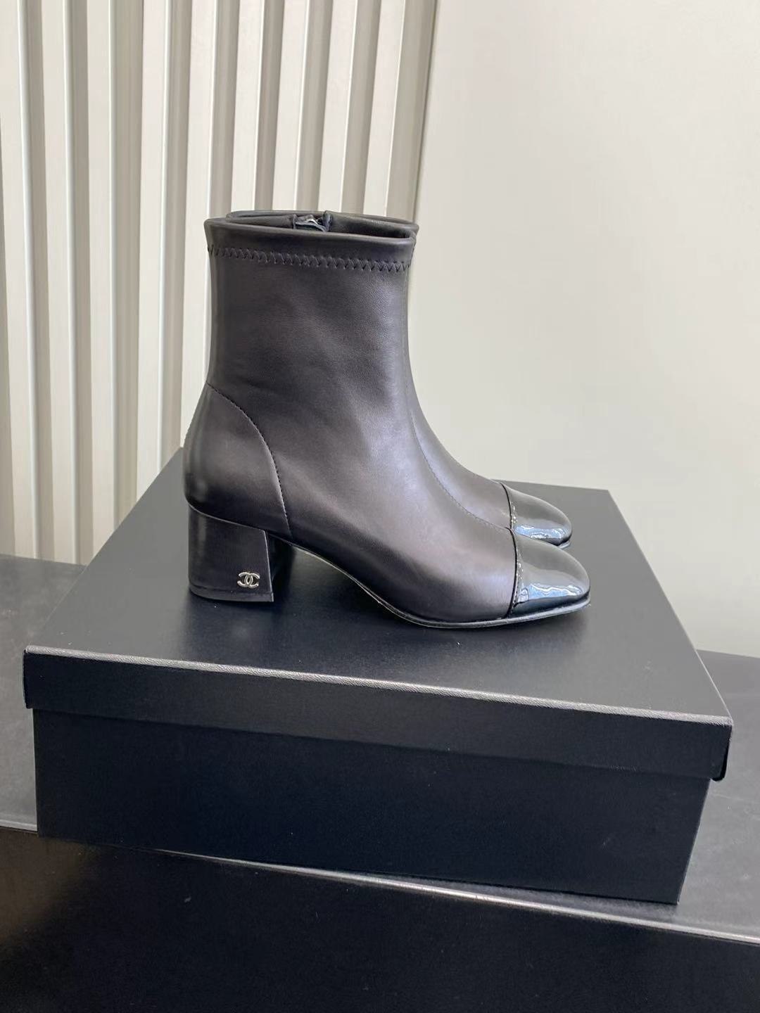 Elegant Black Leather Ankle Boots with Patent Cap Toe & Logo Heel