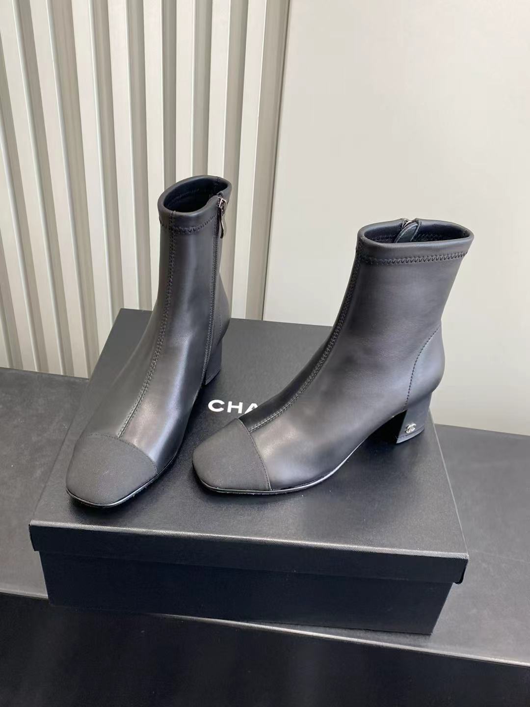 Chanel Black Leather Ankle Boots - Elegant Block Heel CC Logo