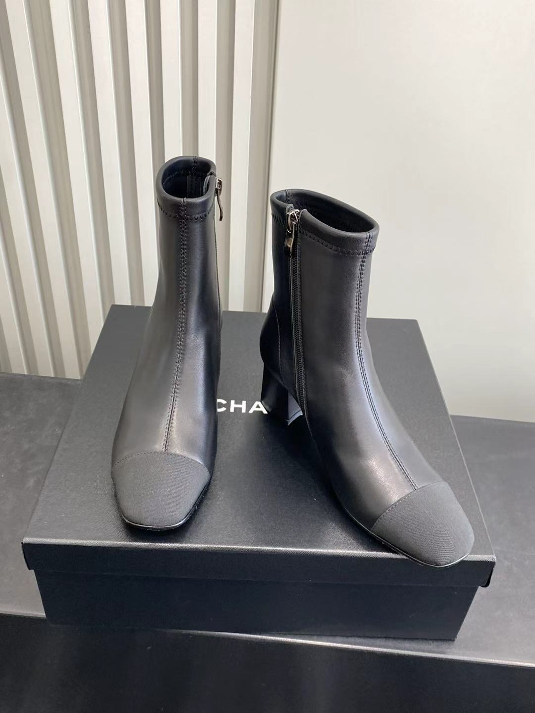 Chanel Black Leather Ankle Boots - Elegant Block Heel CC Logo