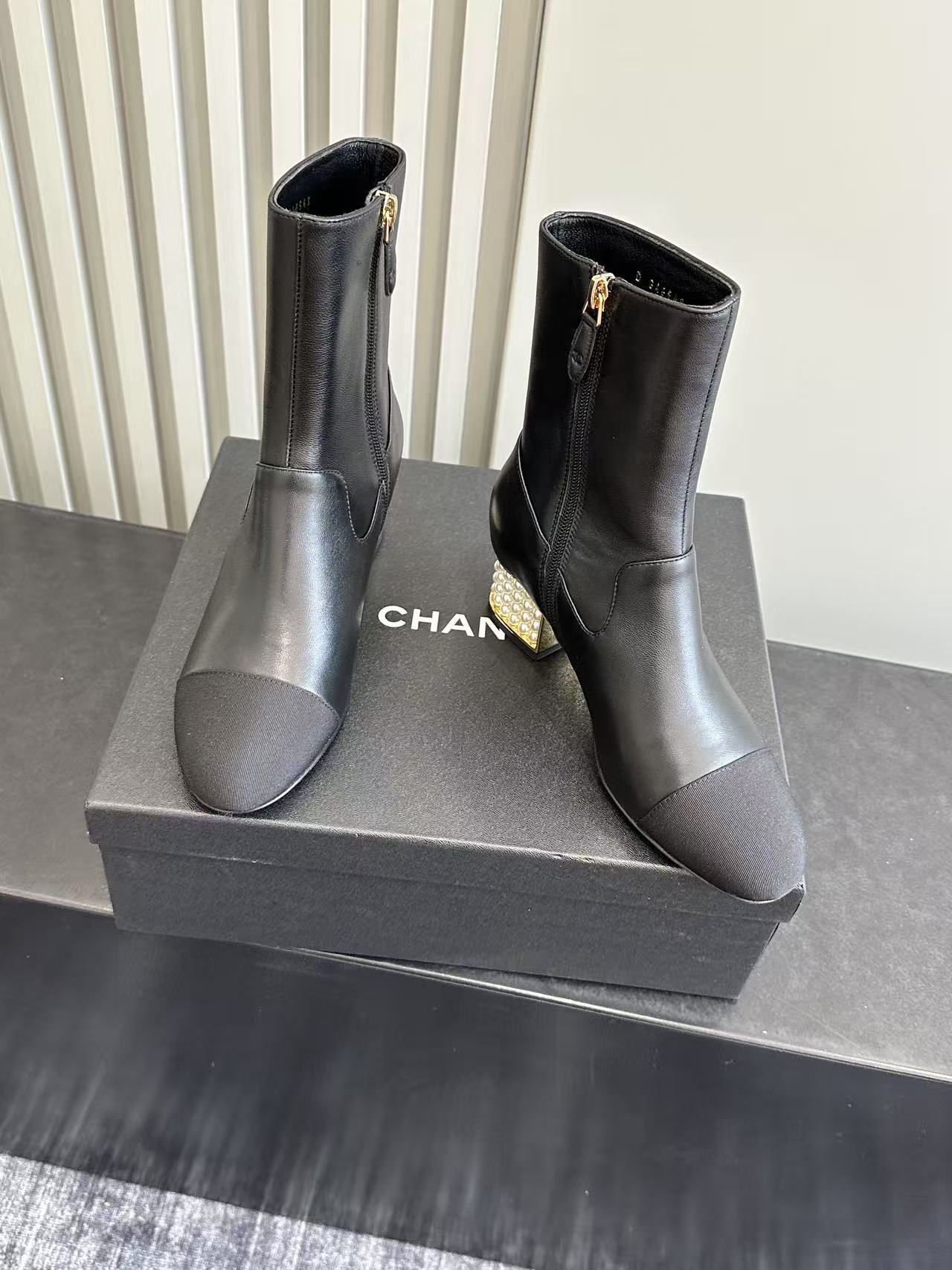 Chanel Black Leather Pearl Heel Ankle Boots - Luxury Designer Shoes