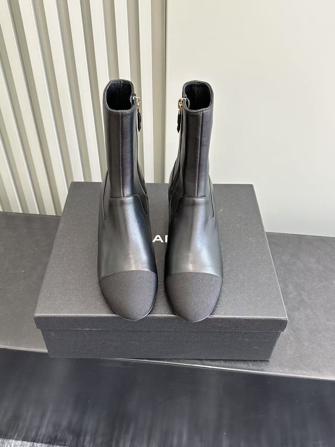 Chanel Black Leather Pearl Heel Ankle Boots - Luxury Designer Shoes
