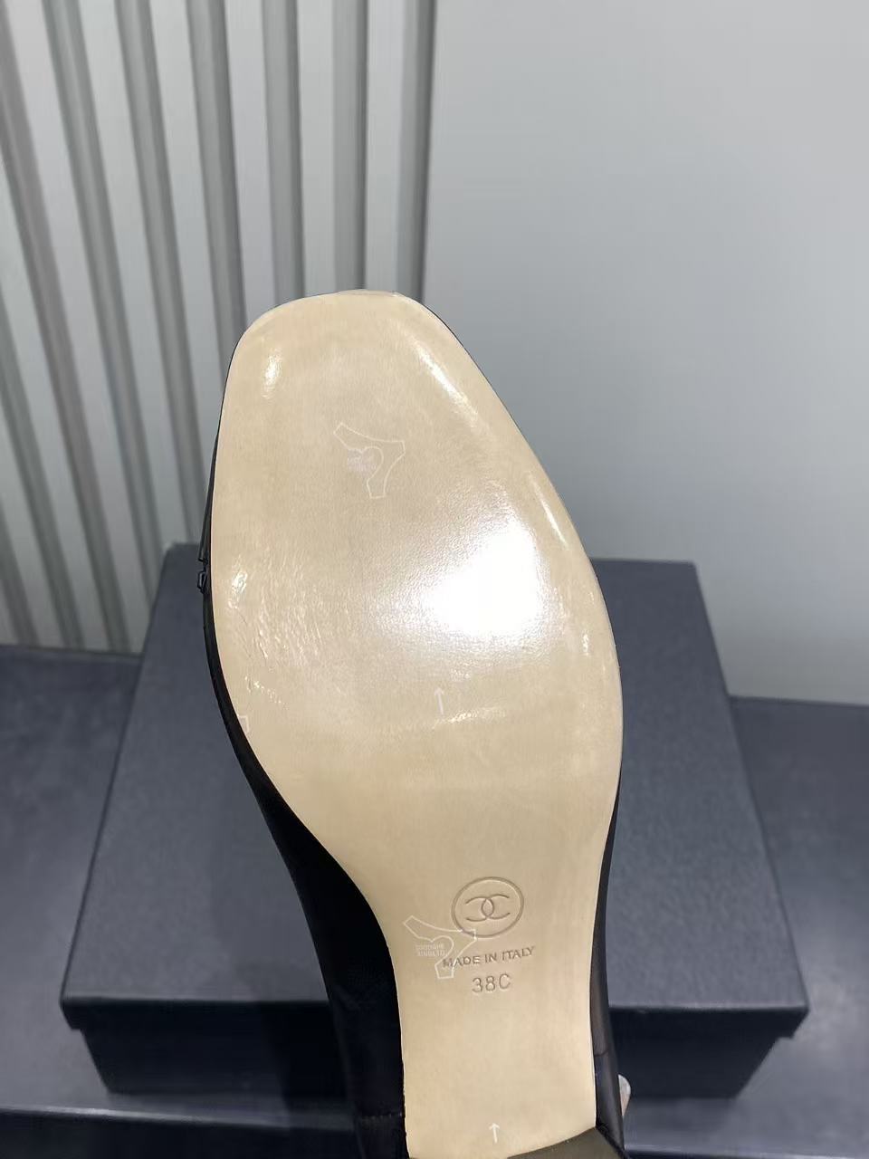 Luxury Black Leather Ankle Boots with Patent Toe & Gold Chain