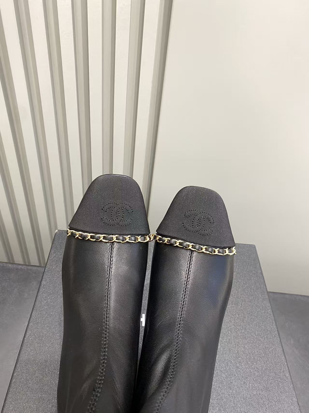 Chanel Black Leather Ankle Boots with Gold Chain and Block Heel