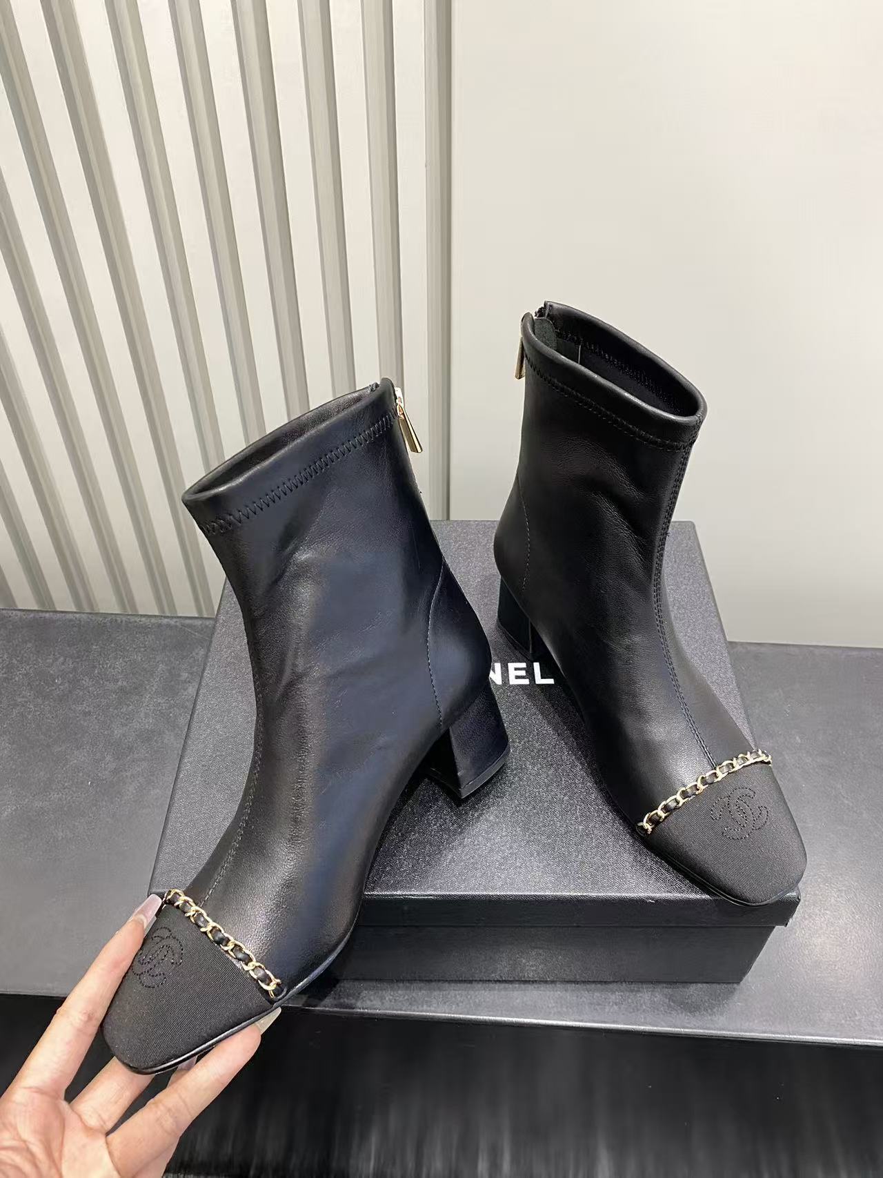 Chanel Black Leather Ankle Boots with Gold Chain and Block Heel