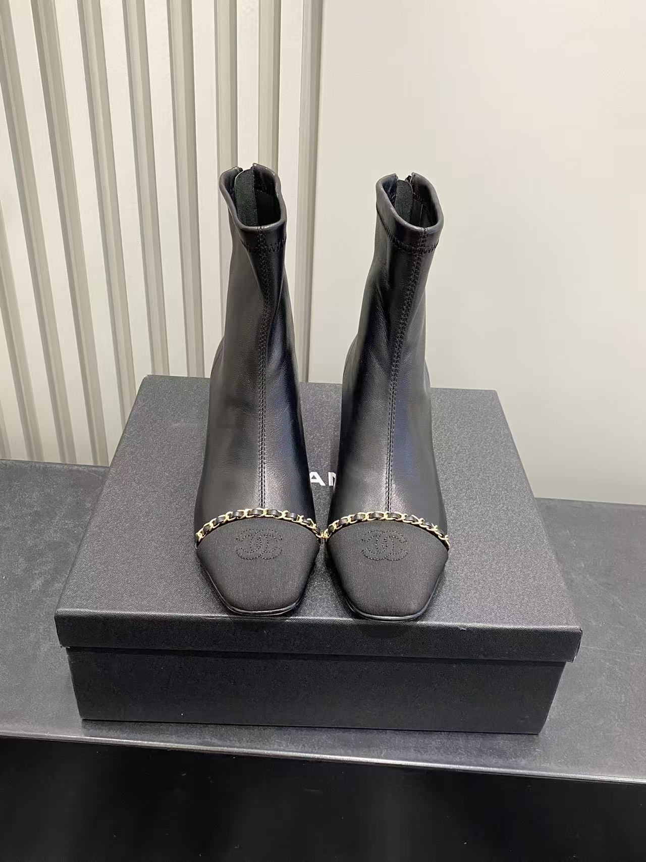 Chanel Black Leather Ankle Boots with Gold Chain and Block Heel