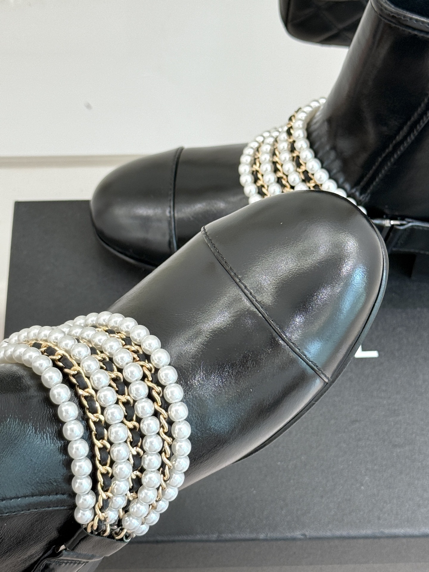 Luxury Black Leather Ankle Boots with Pearl Chain Detail